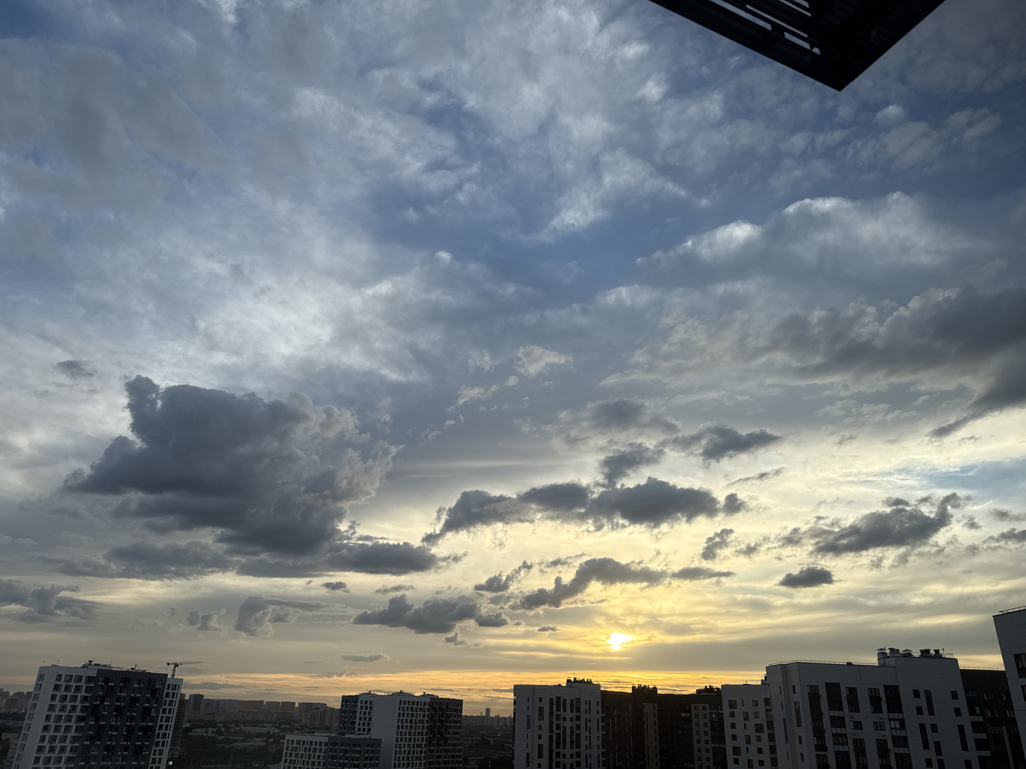 Cloud-watching over Lyubertsy's rooftops at sunset