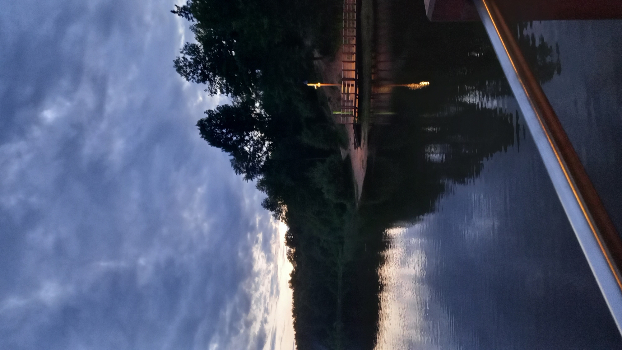 Evening lakefront recreation area documented in Krasnogorsk, Russia