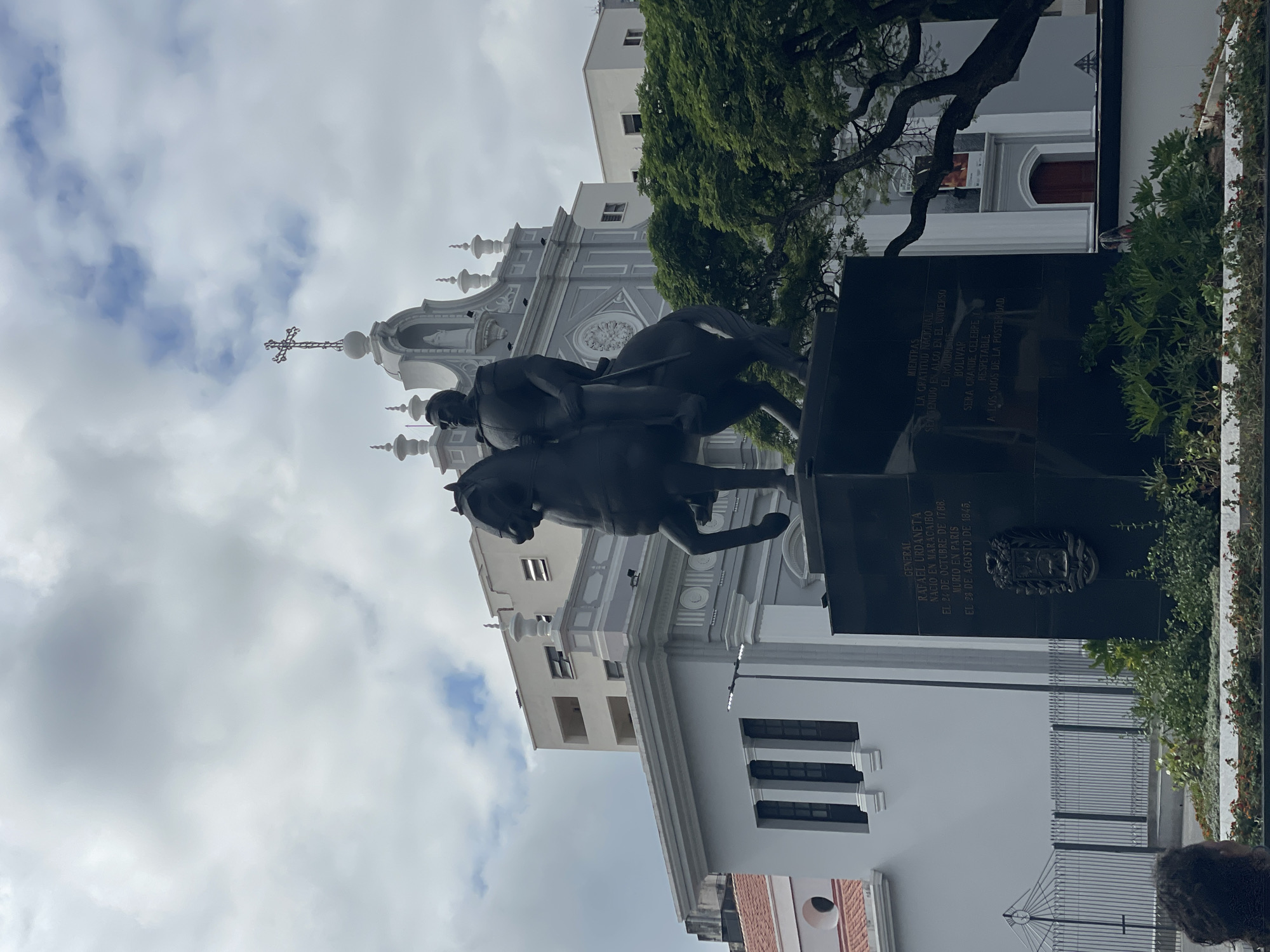 Tourist documents historic monuments and architecture in central Caracas