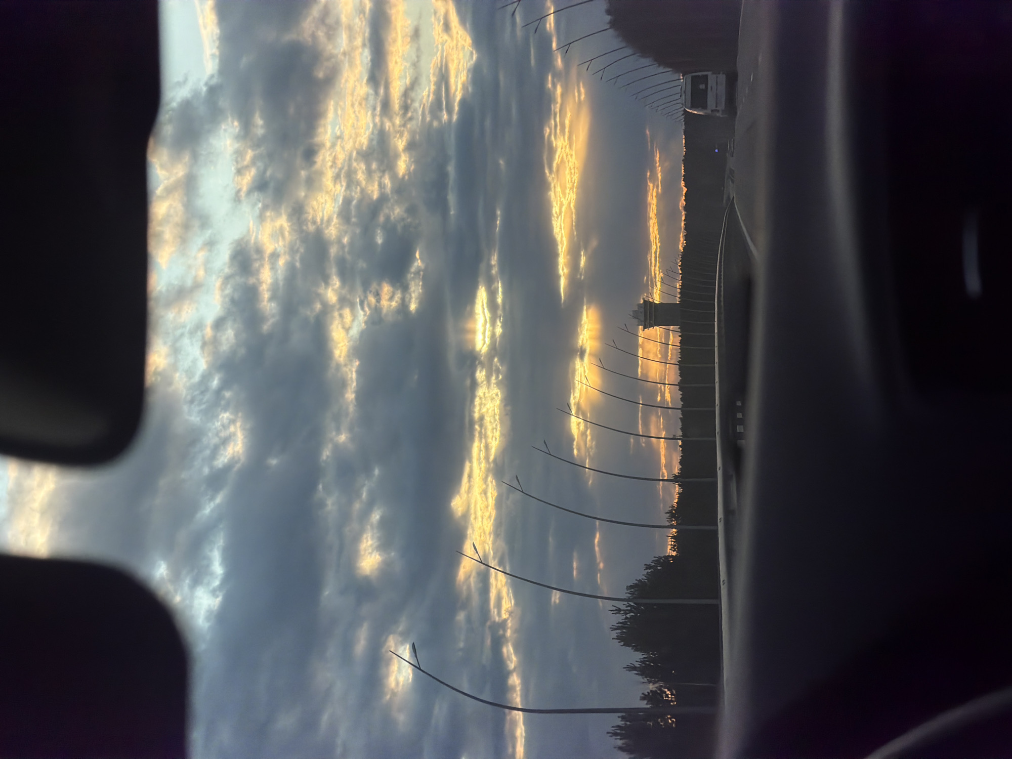 Highway journey captured during golden hour in Krasnoyarsk