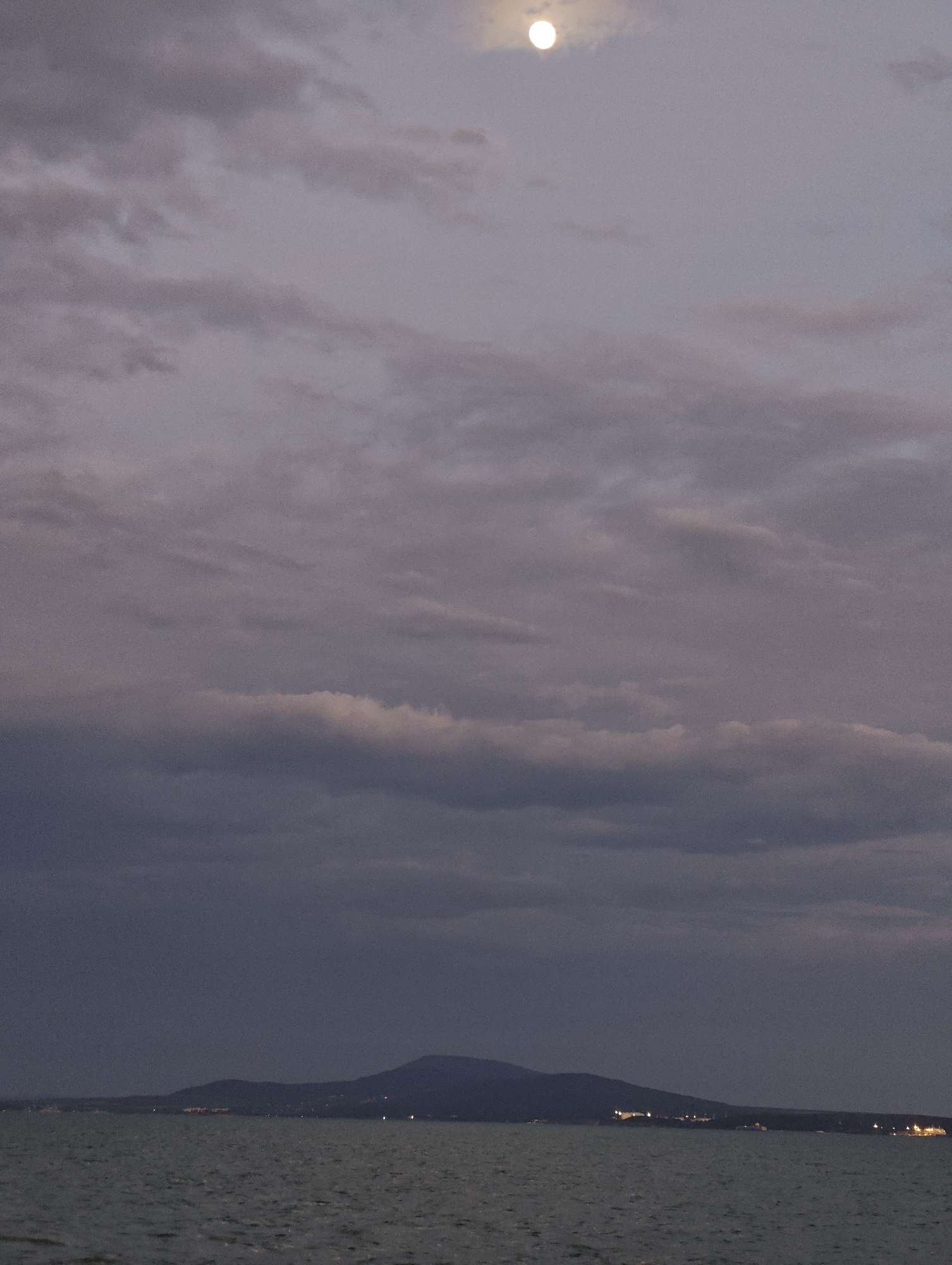 Evening coastal scenes captured along Burgas waterfront during twilight