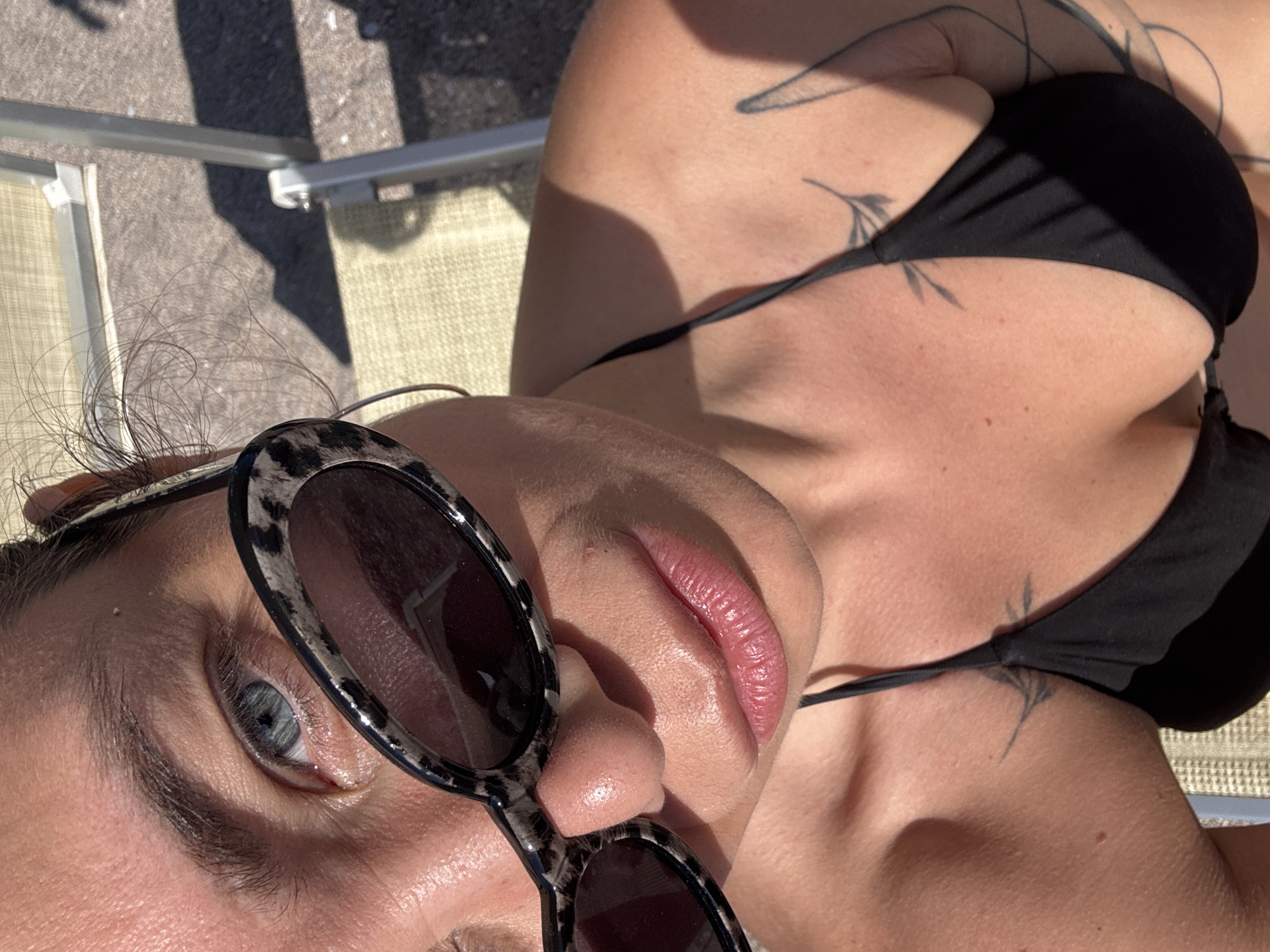 Woman enjoys beach day with puppy at Montenegro resort
