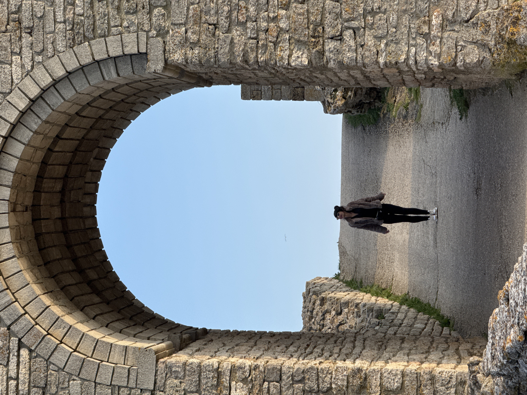 Tourist visits ancient stone ruins in Balgarevo, Bulgaria