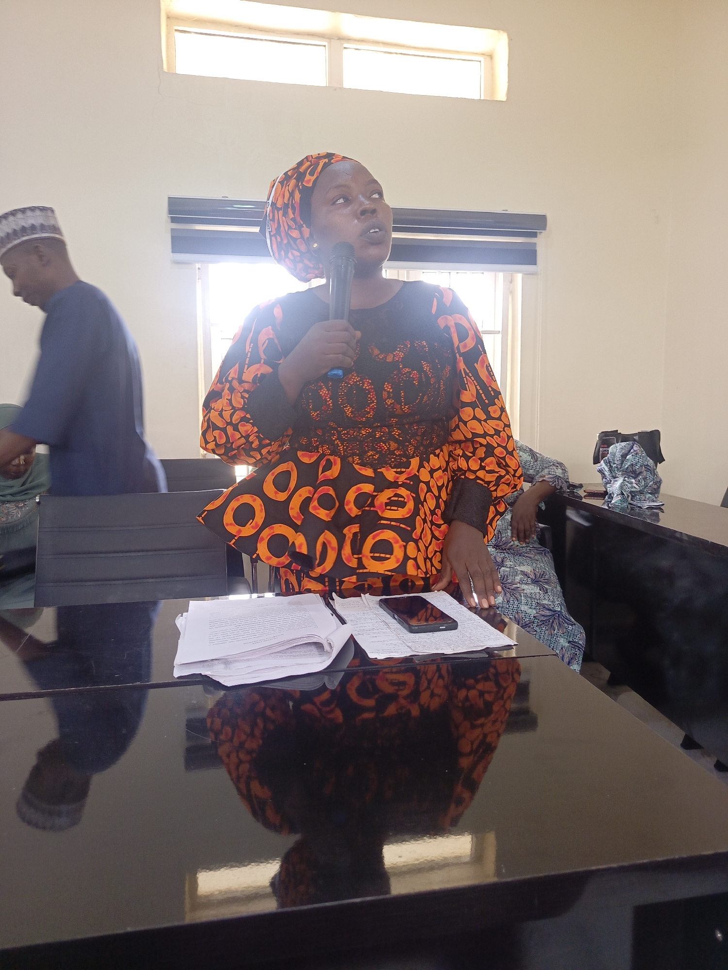 Formal meeting with microphone presentation held in Lafia, Nigeria