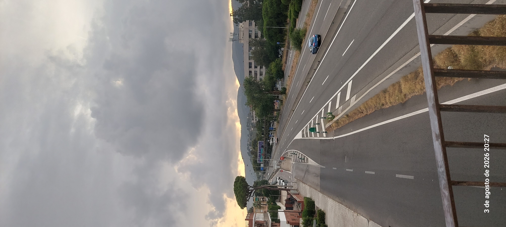 Castelldefels at dusk: planes, highways, and coastal views