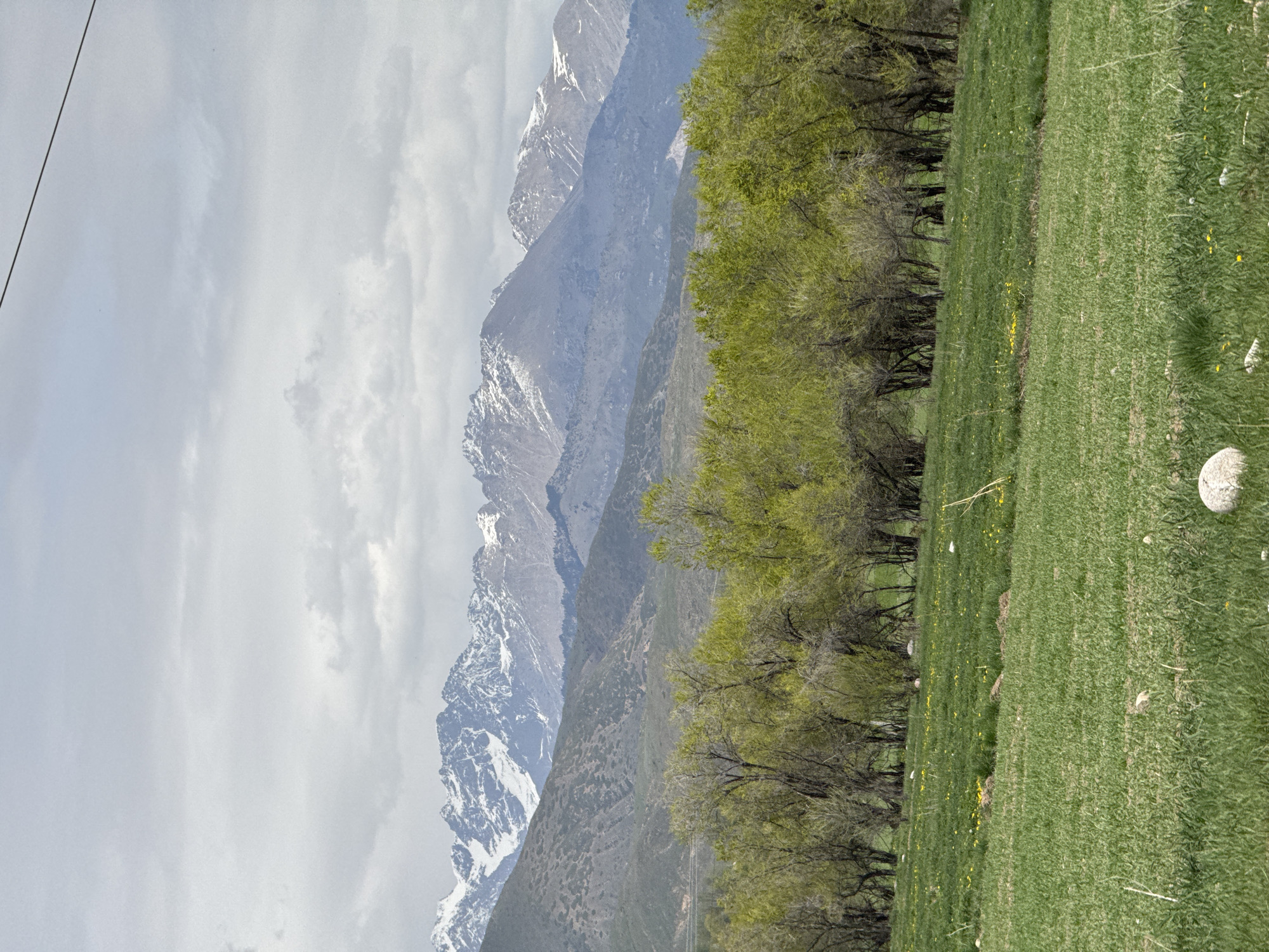 Mountain landscape documented in Grigor'yevka, Kyrgyzstan under overcast skies