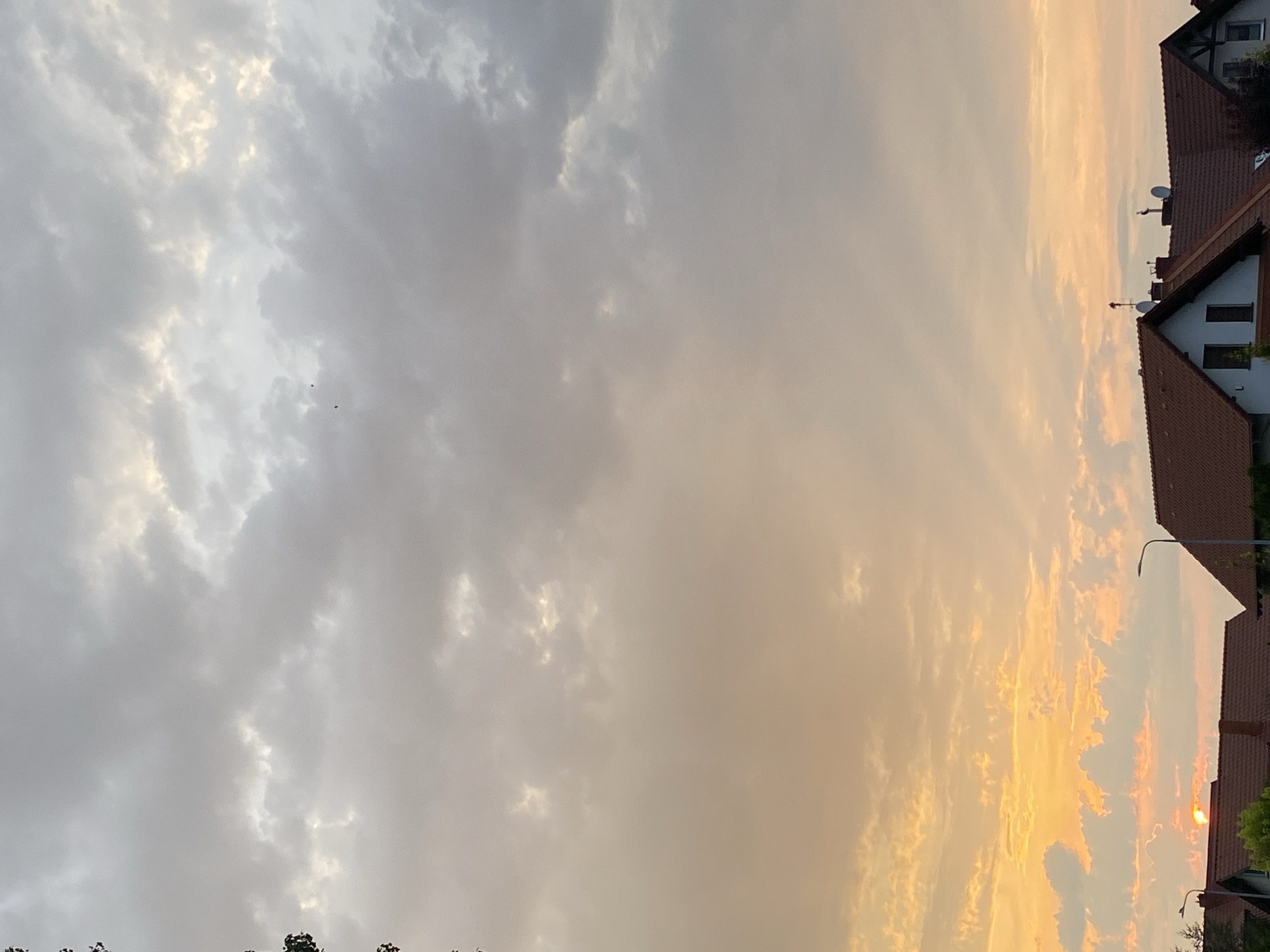 Sunset settling over the rooftops of Buk, Poland