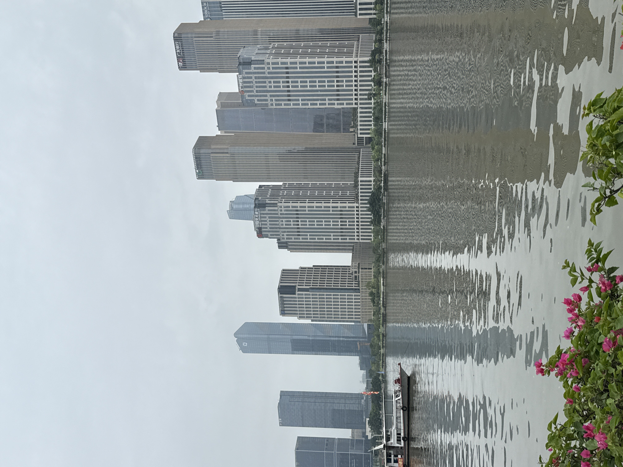 Guangzhou's Tianhe riverfront on an overcast afternoon