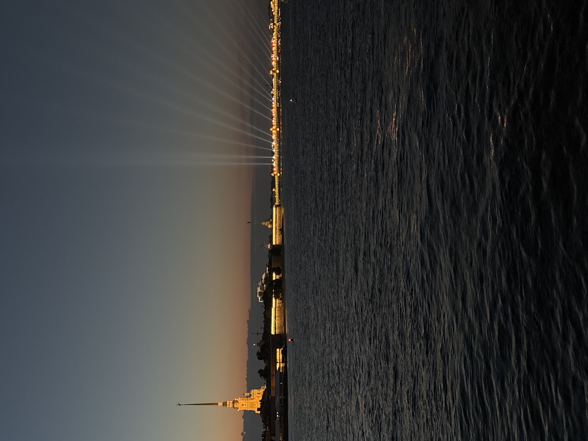 Saint Petersburg's waterfront landmarks glow during a late-night light show