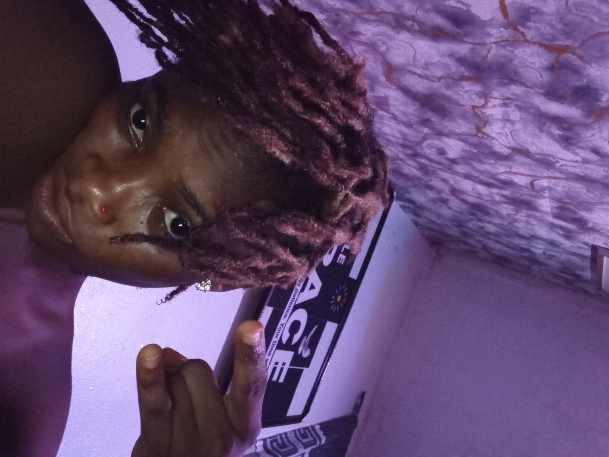 Person documents indoor photo session in Shagamu, Nigeria