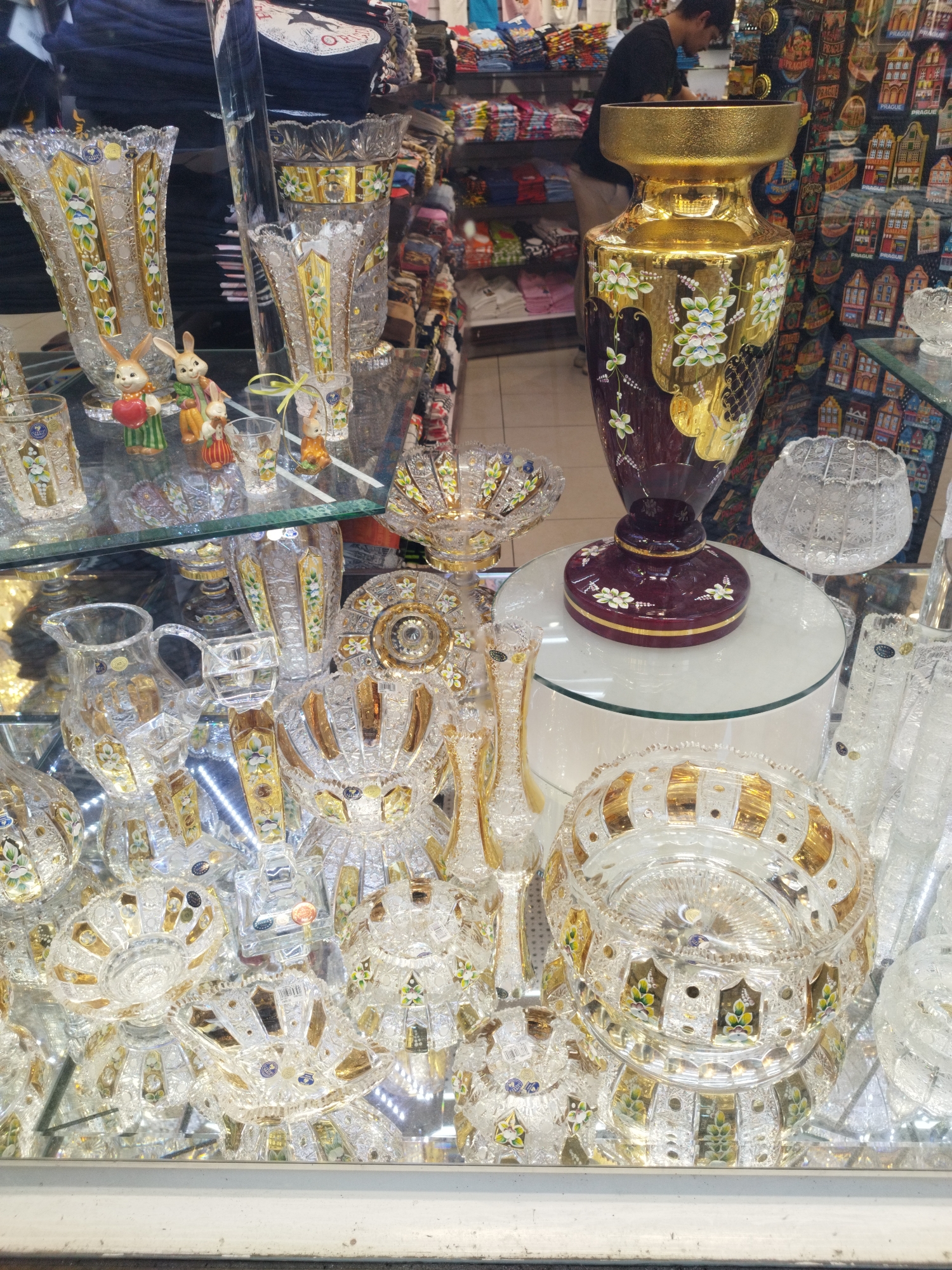 Colorful crystal glassware on display in a Prague shop