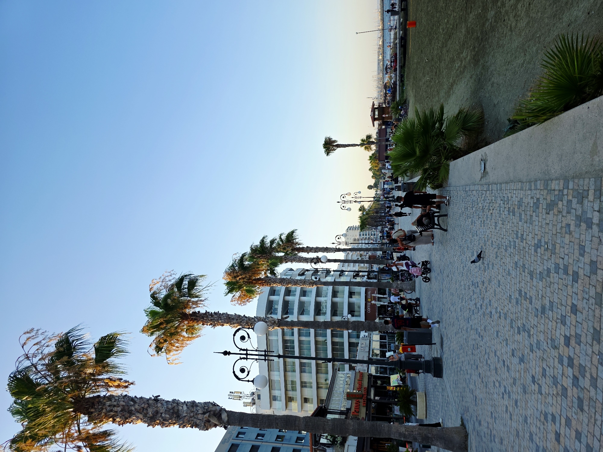 Late afternoon along Larnaca's Finikoudes Promenade, food and sea views