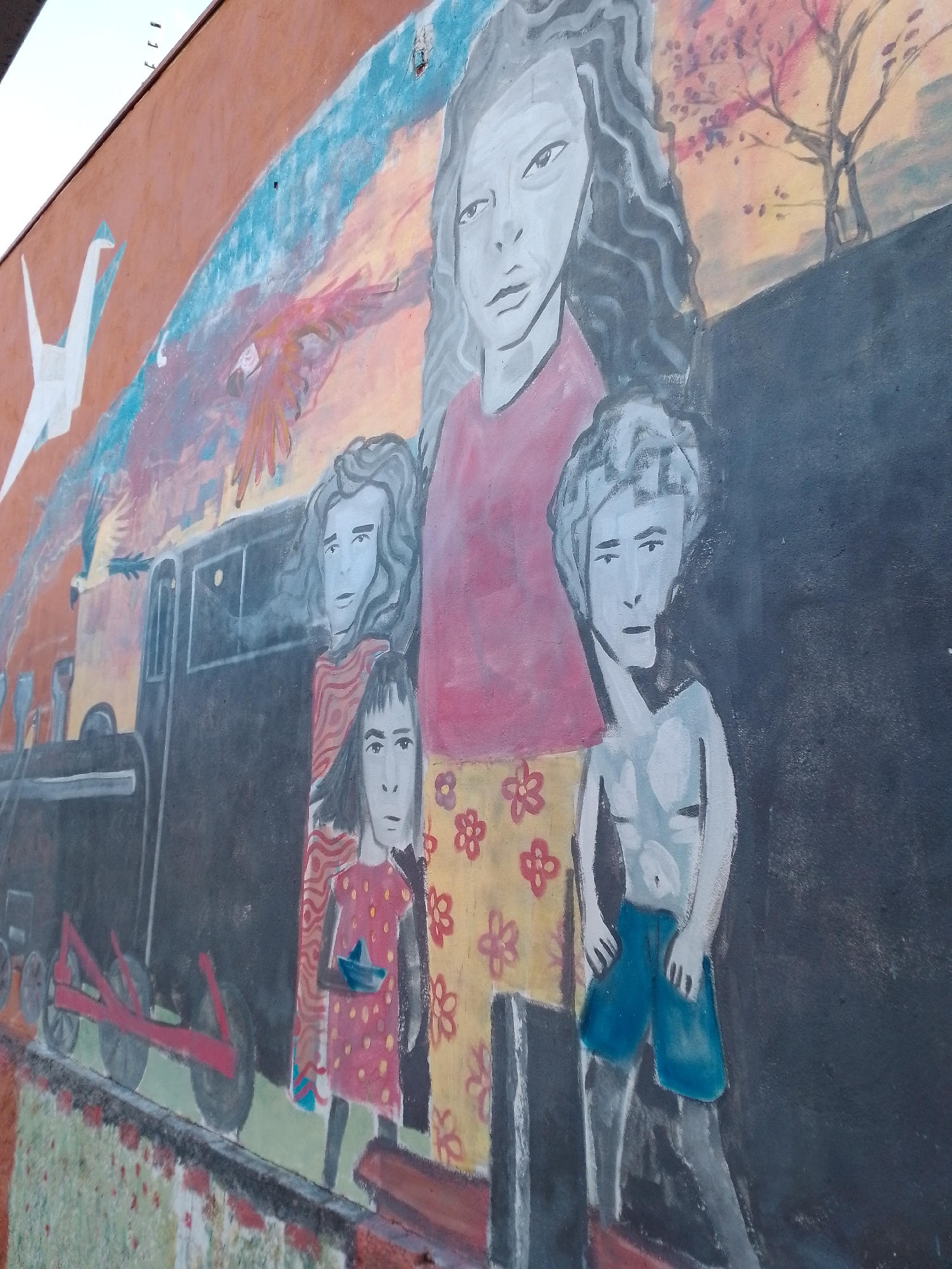 Public art documented in Campo Grande includes mural, locomotive monument
