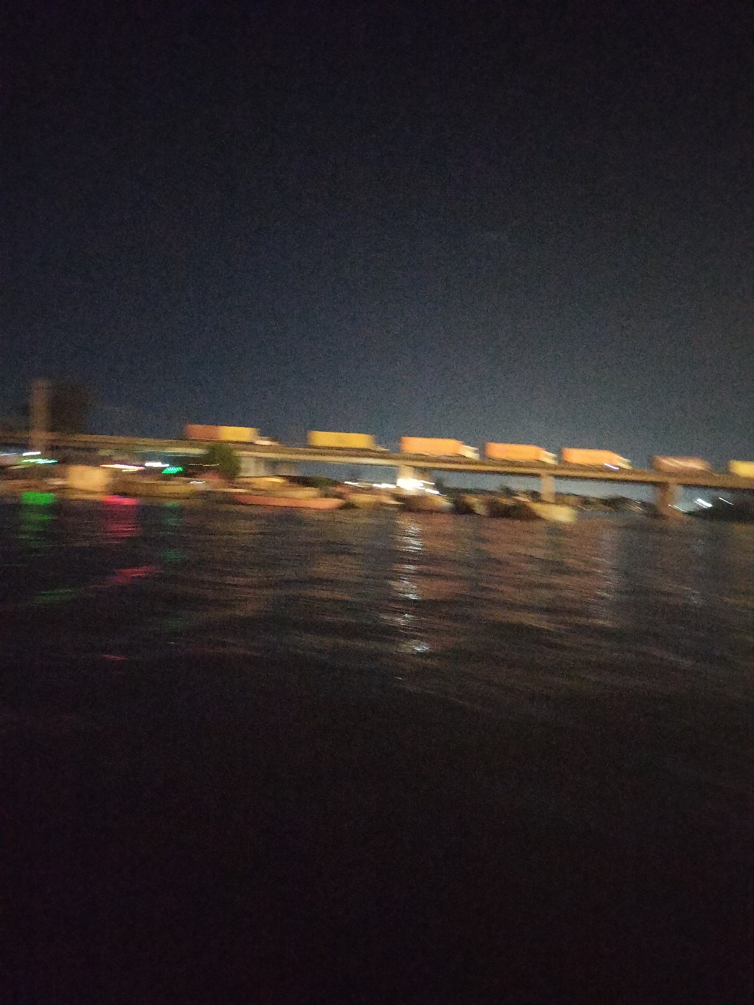 Evening traffic and boat activity recorded at Alaiyabiagba bridge