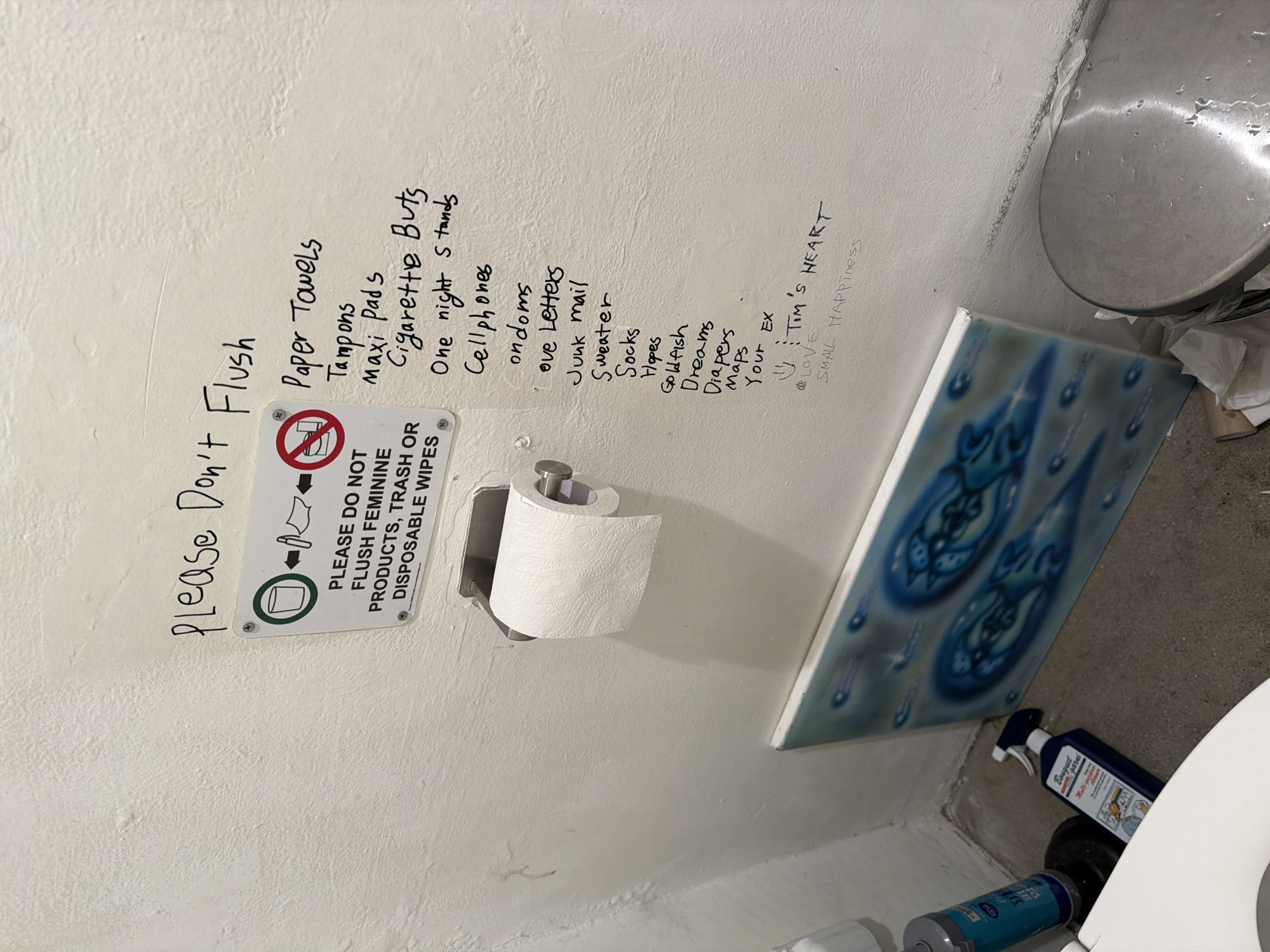 Handwritten graffiti documented on Seoul bathroom wall