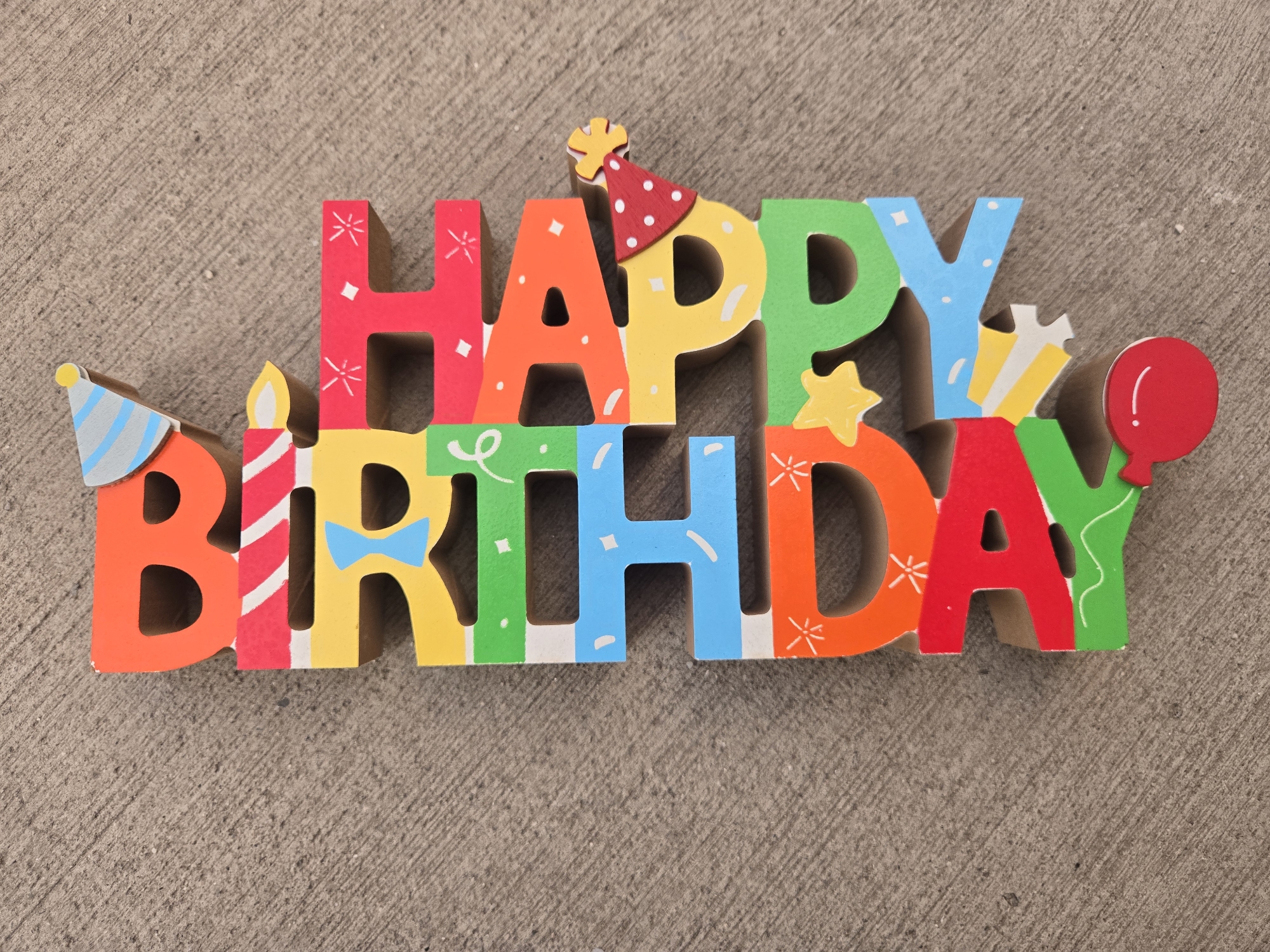 Birthday celebration documented alongside urban street scenes