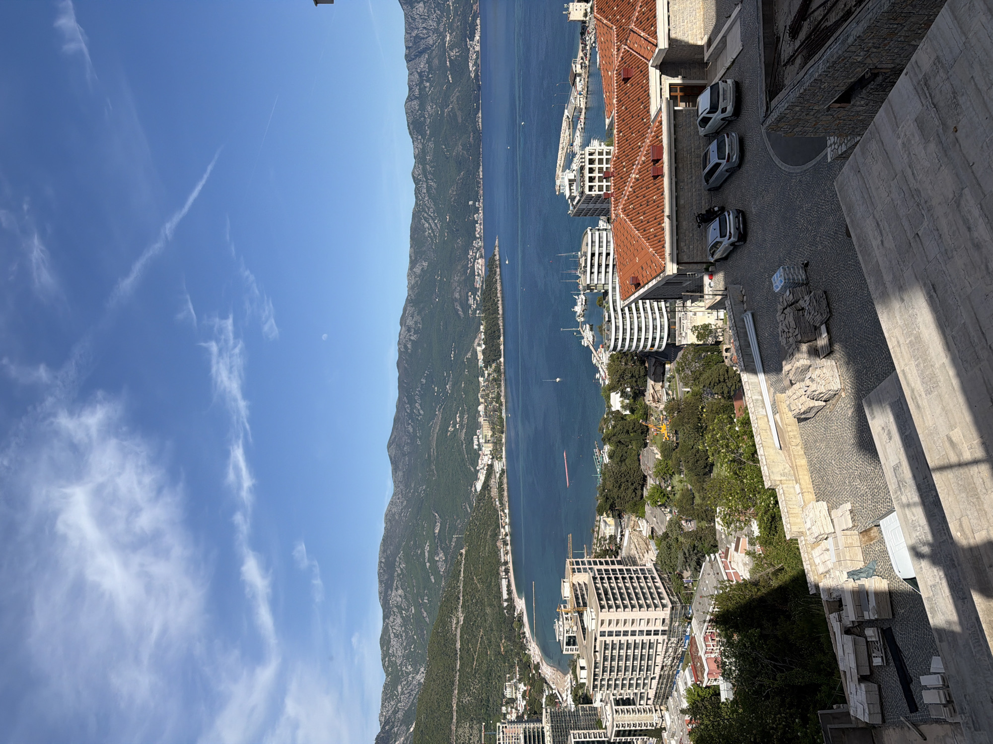 Tourist documents afternoon visit to Budva coastline with selfies