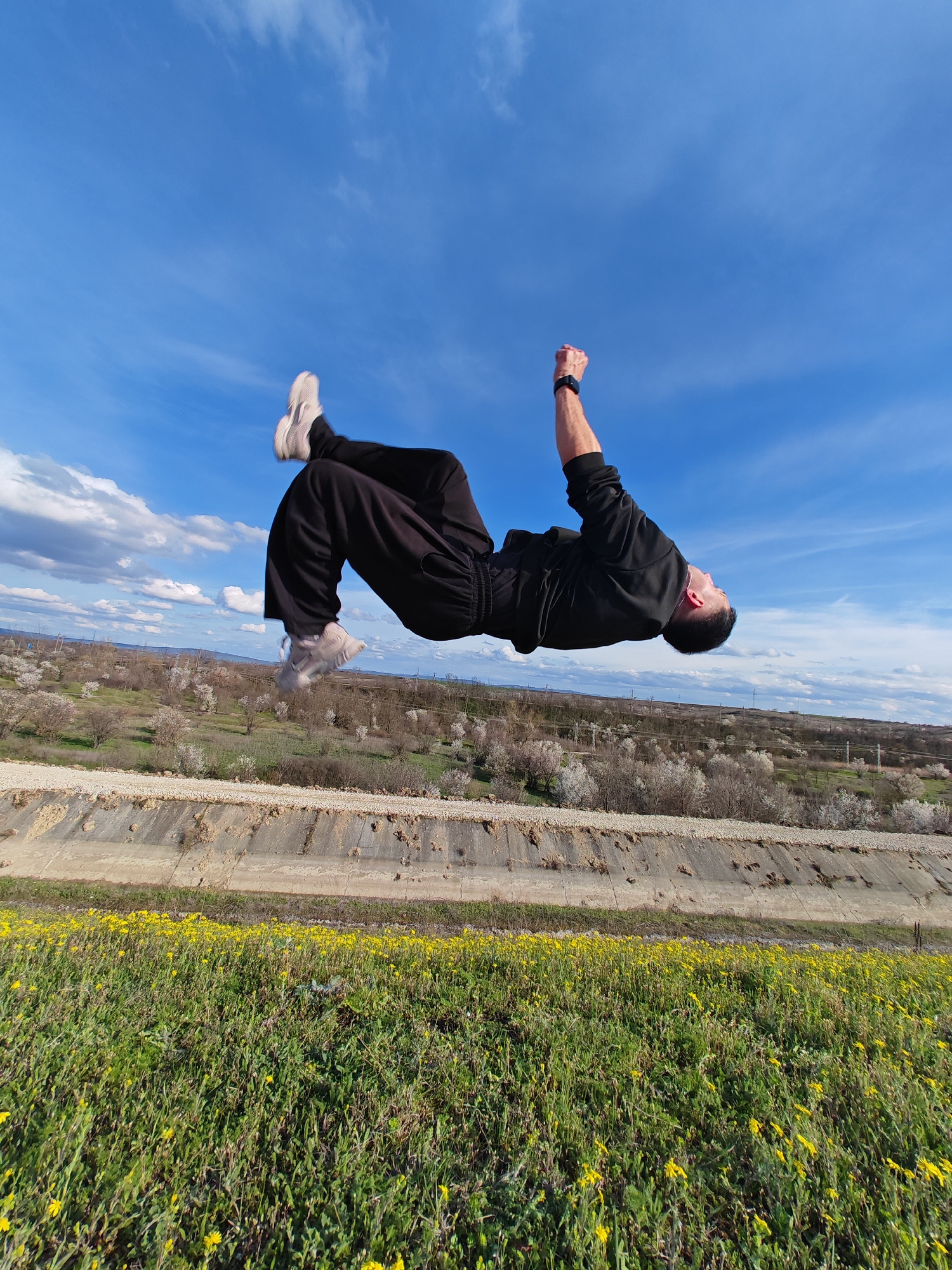 Man exercises and takes selfies under Asparuhov Bridge
