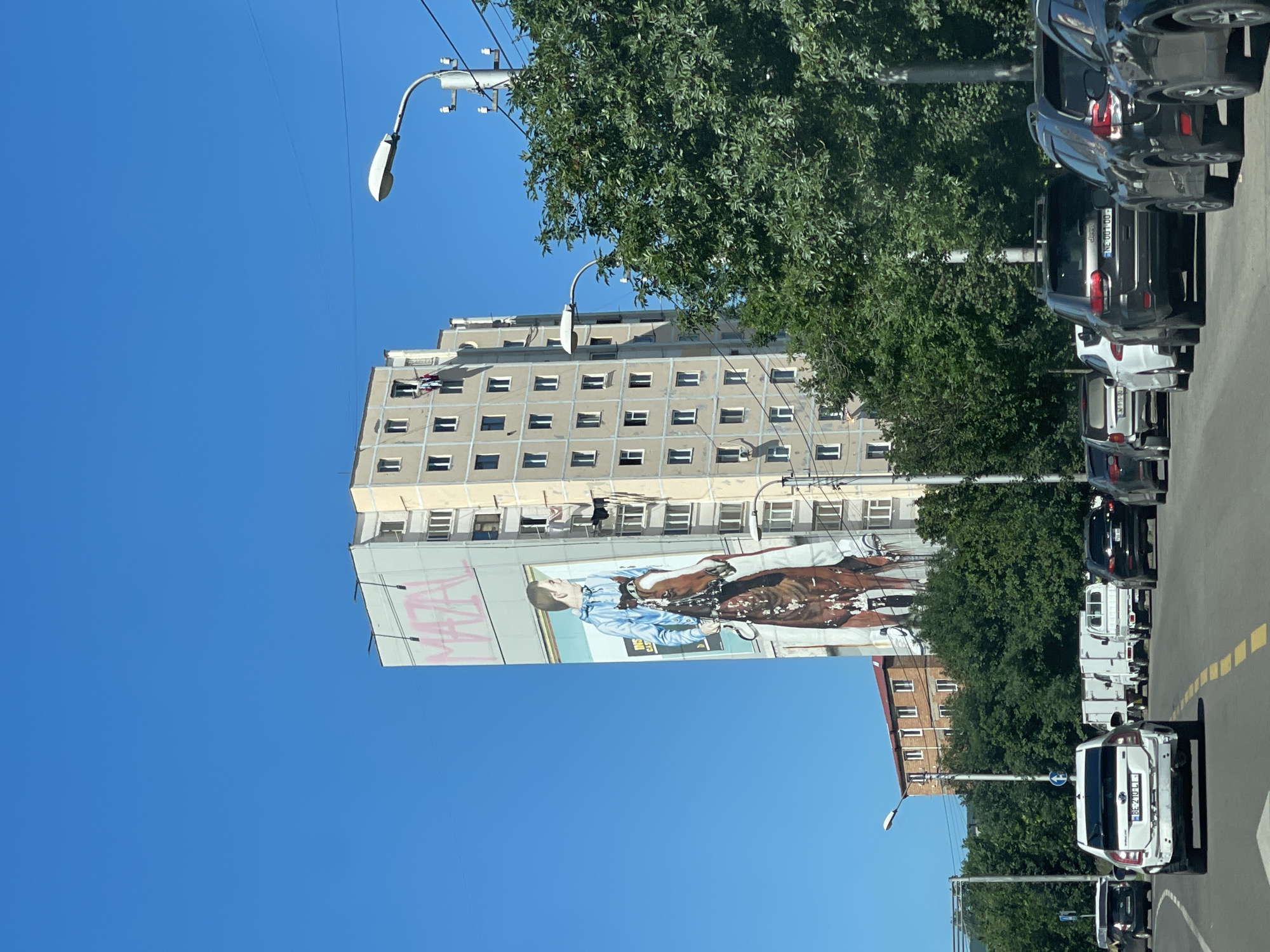 Tbilisi street scenes with muraled buildings documented by witnesses