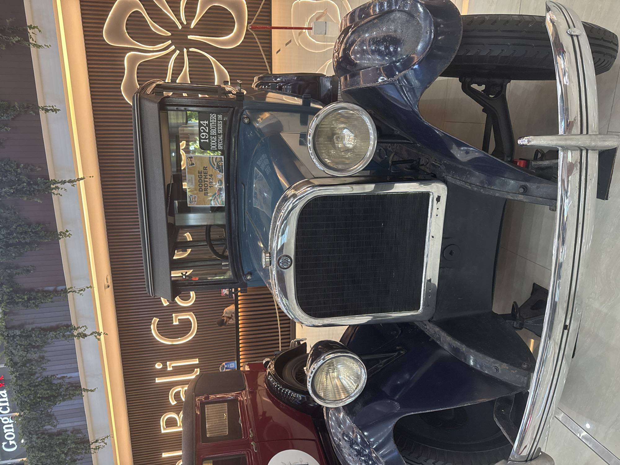 Vintage car exhibition showcases classic automobiles at Bali shopping mall