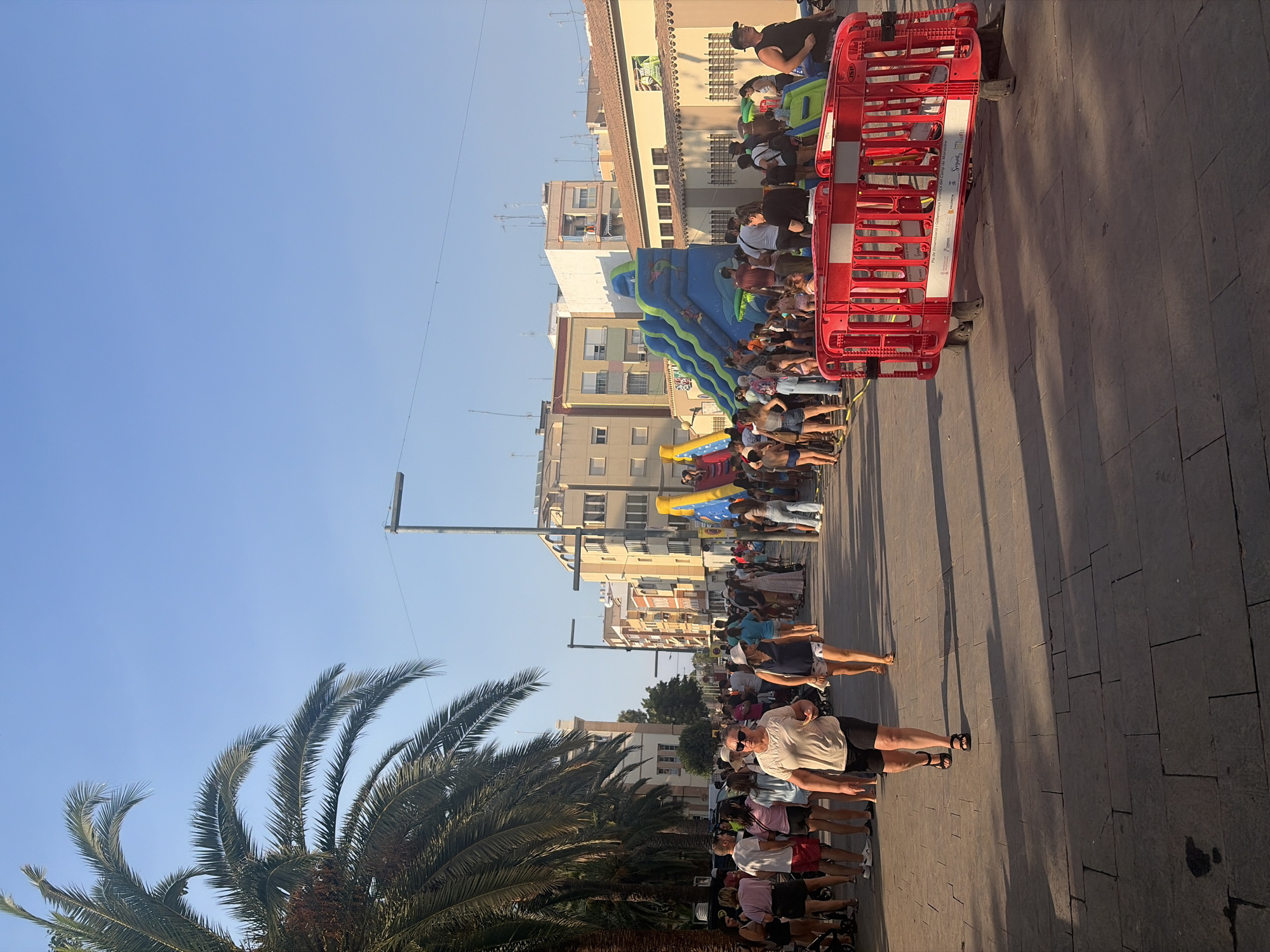 Foam party and inflatable slide at Sagunto summer street festival