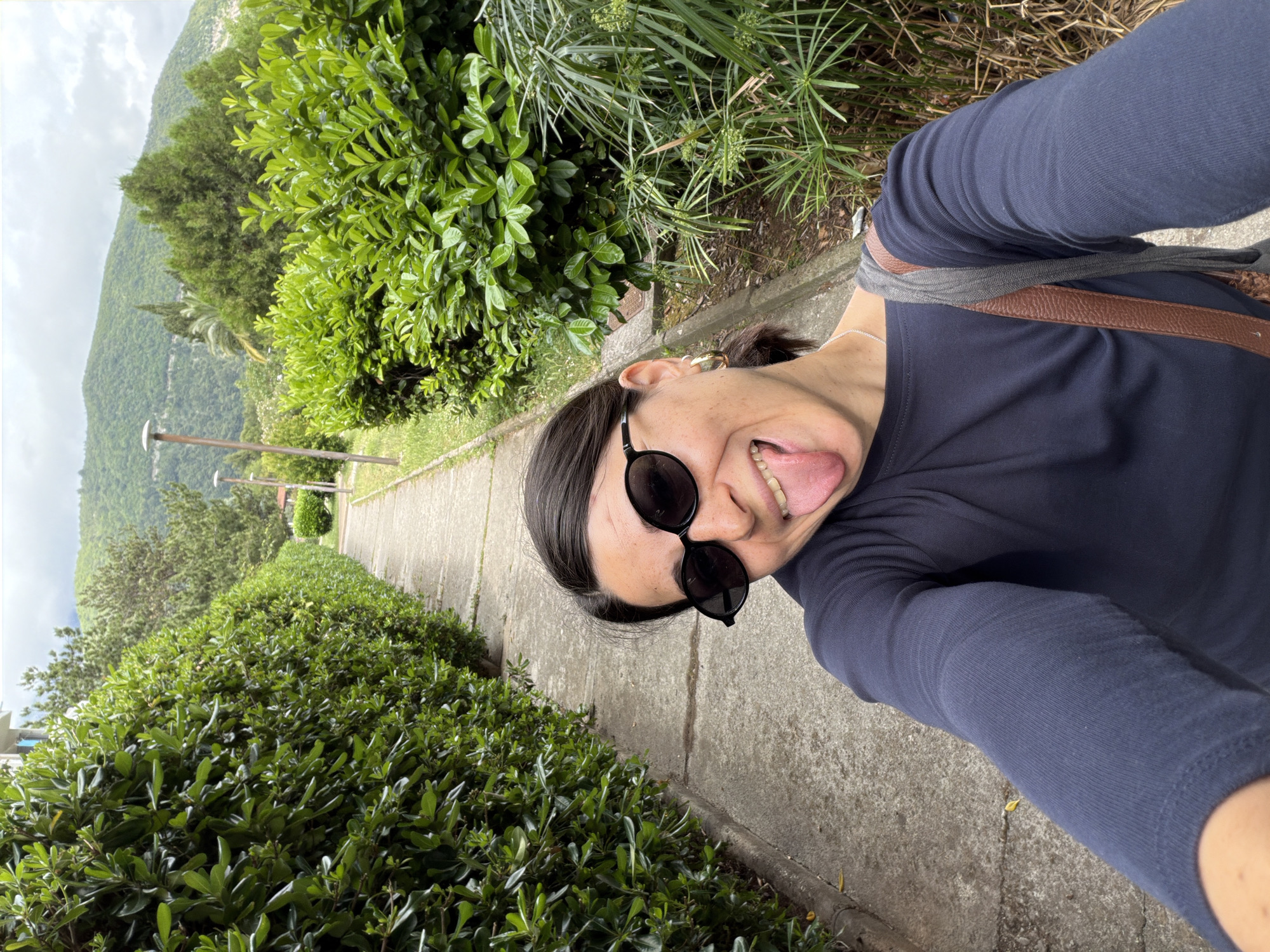 Woman takes selfie on path in Budva, Montenegro