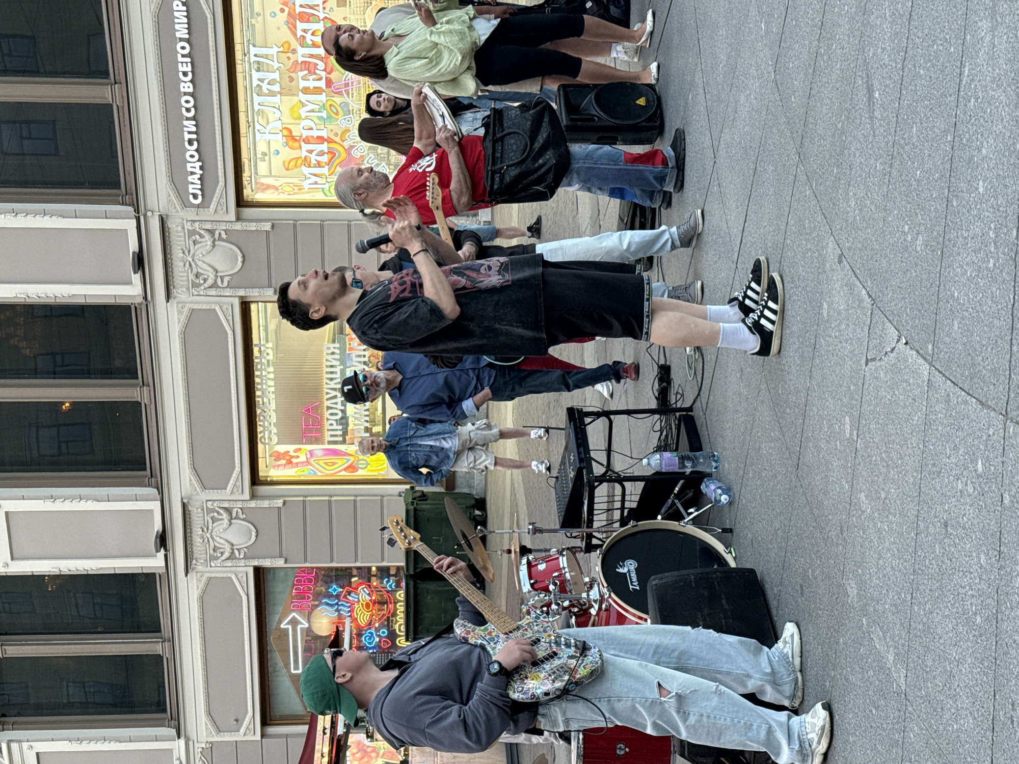 Live music, dancing, and canal life on a Saint Petersburg afternoon