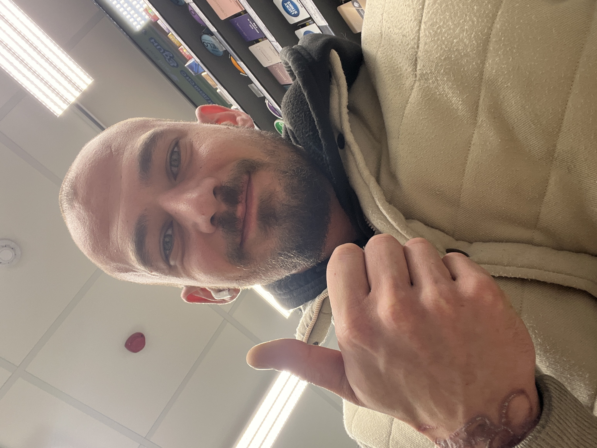 Man takes selfie while shopping in Sofia store