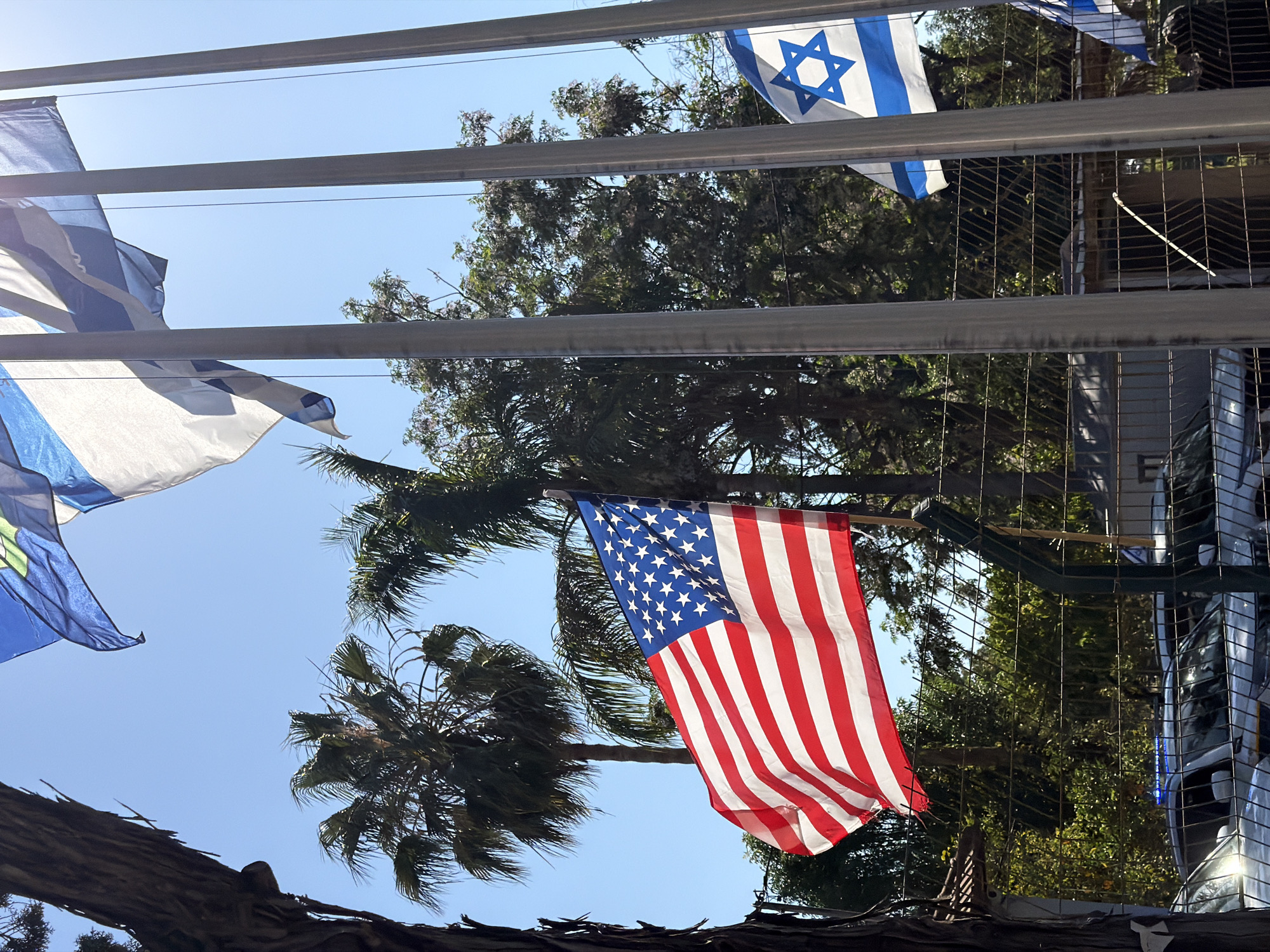 Community gathering with flags observed in Ramat Gan park