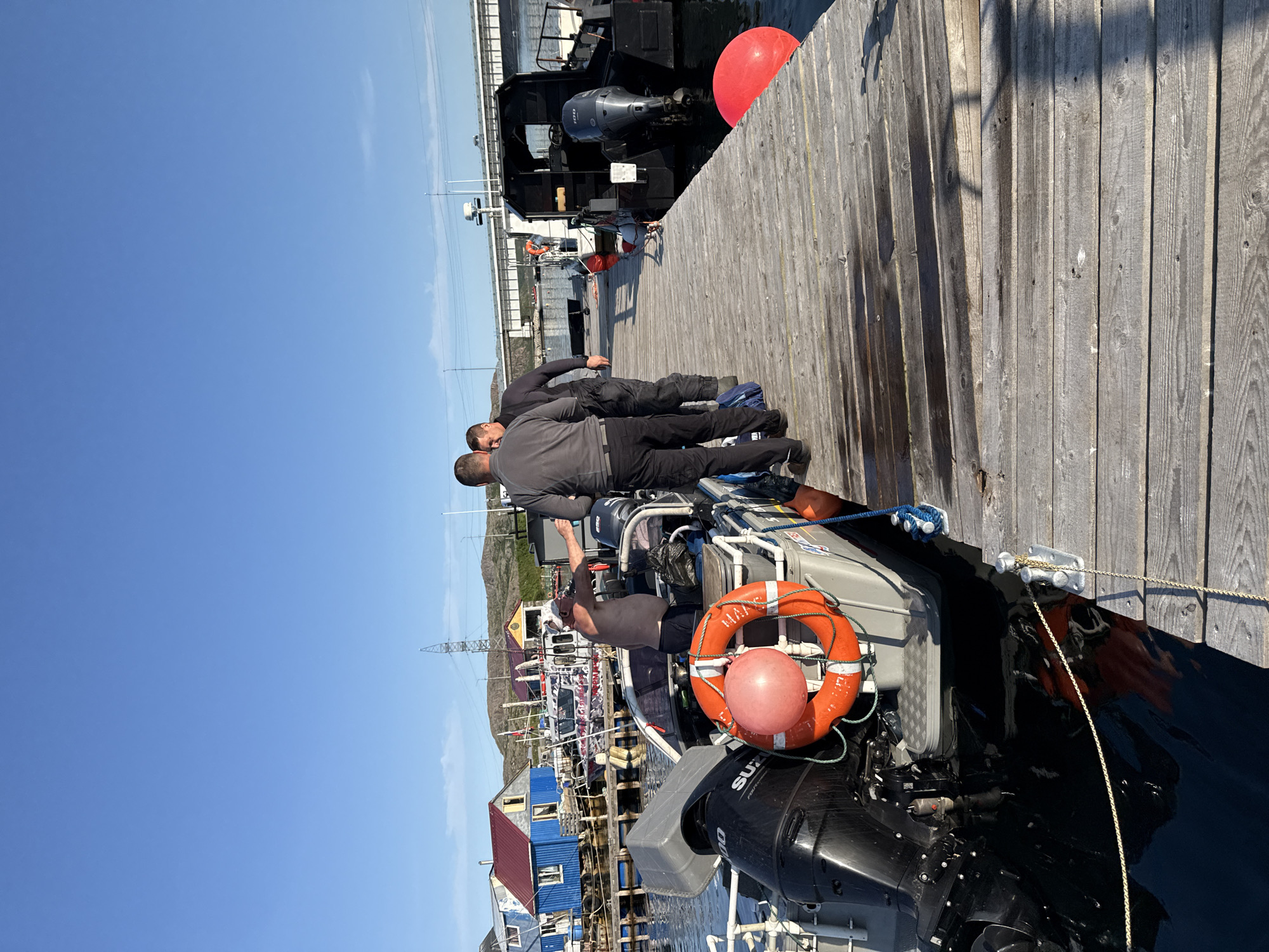 Sunny afternoon at Teriberka's harbor dock