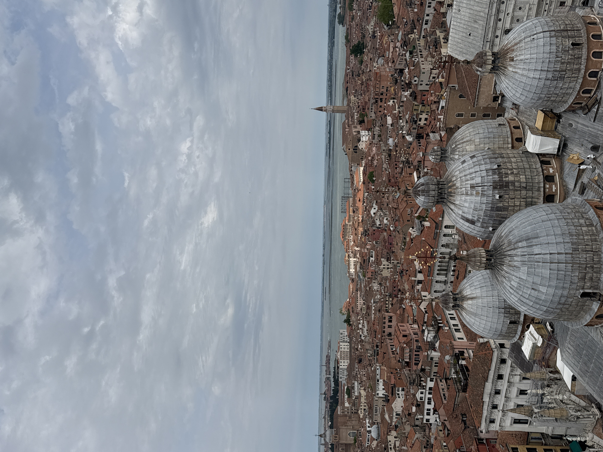 Tourist captures panoramic views of Venice from campanile