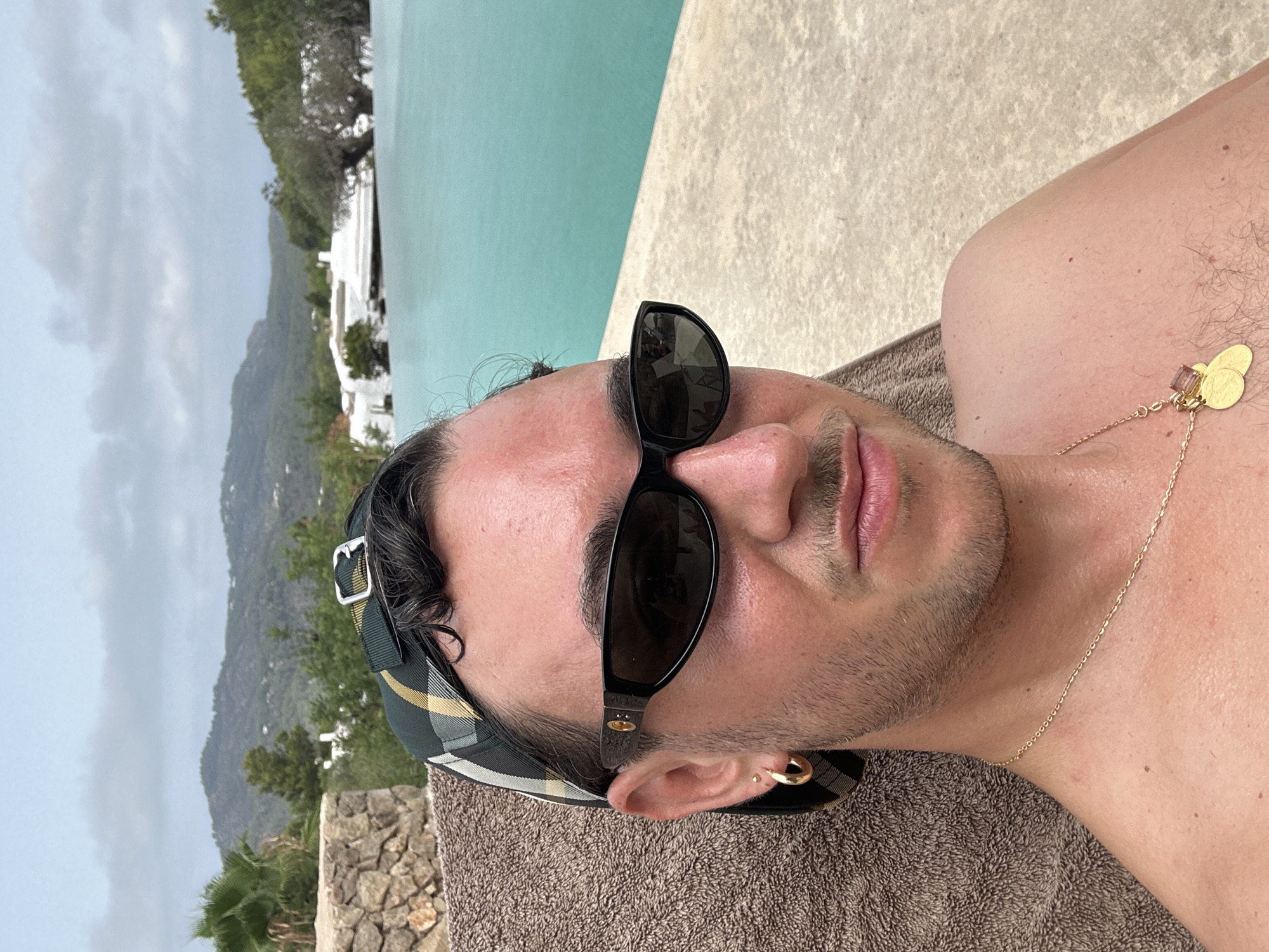 Sunny morning at a scenic pool with resort vibes