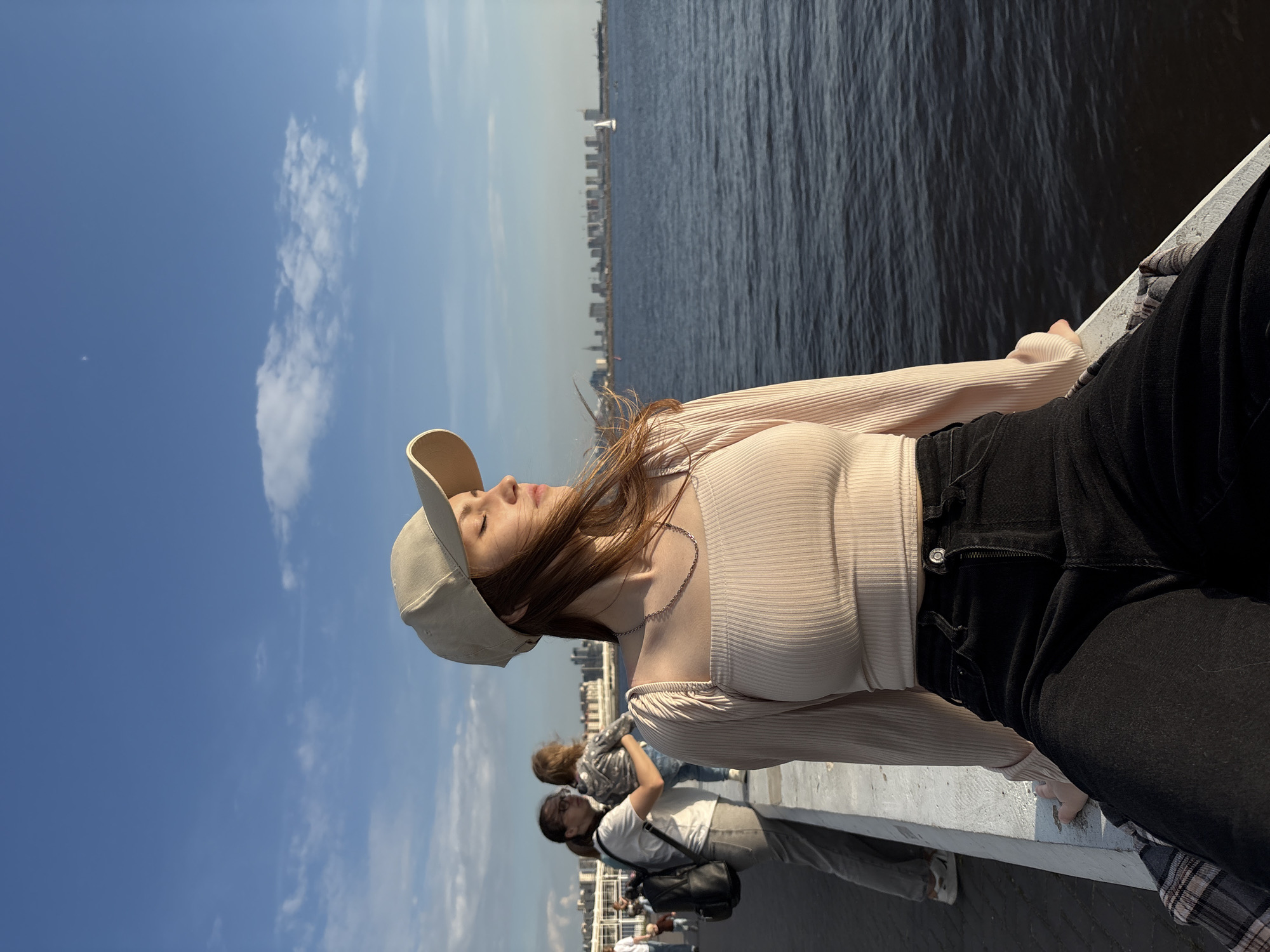 Woman enjoys afternoon by Saint Petersburg waterfront