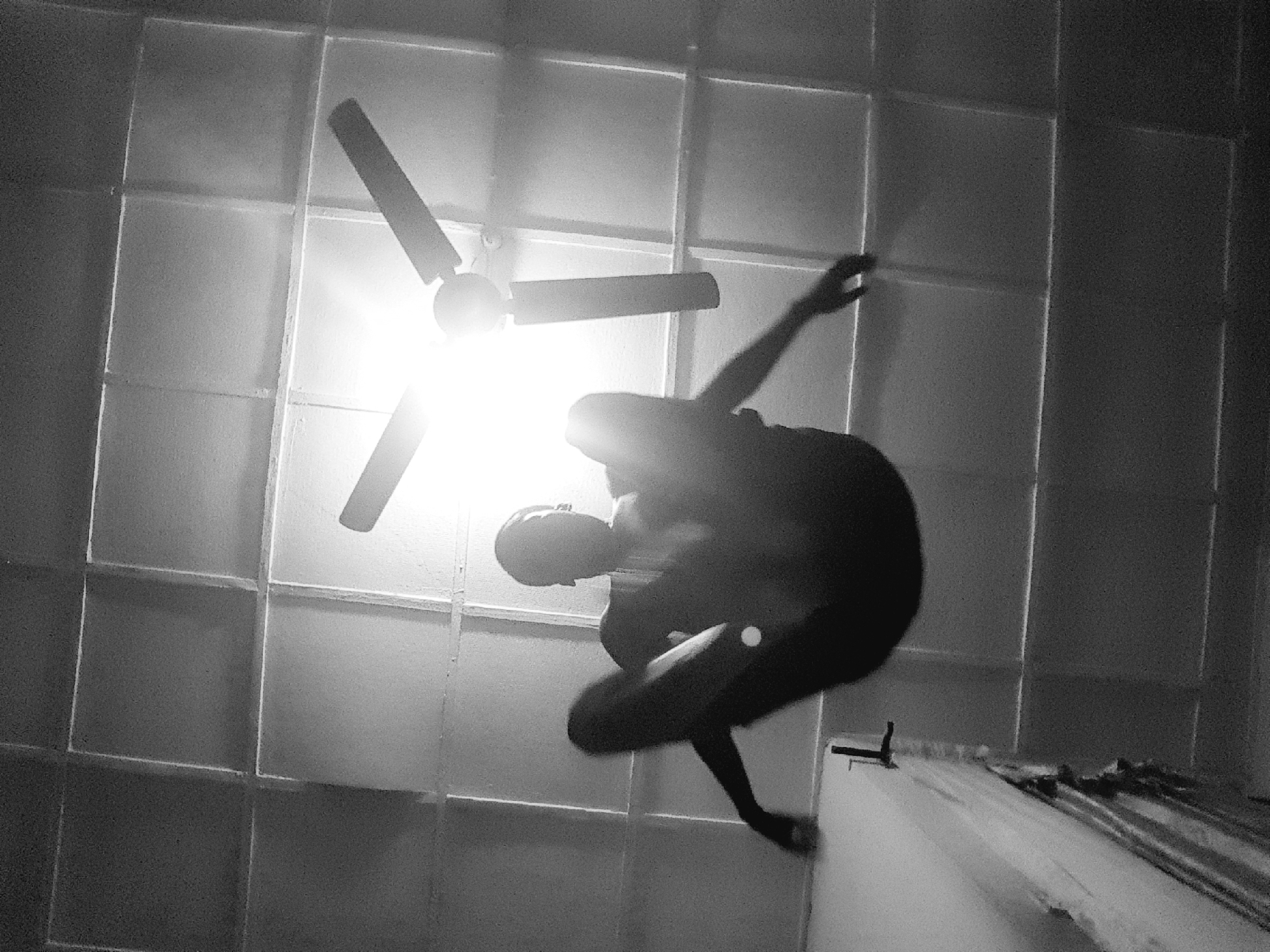 Airborne figure captured in dramatic silhouette photograph in Narayi
