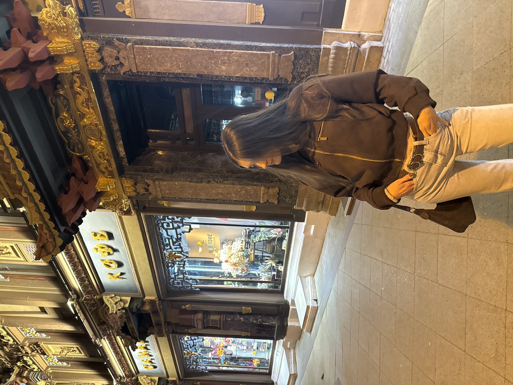 Evening selfie session near Moscow's historic Perlov Tea House