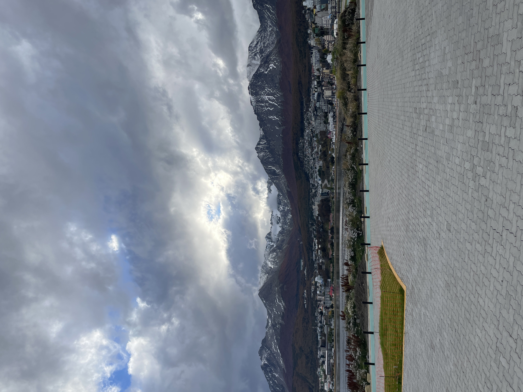 Overcast skies with sunlight observed over Ushuaia mountains