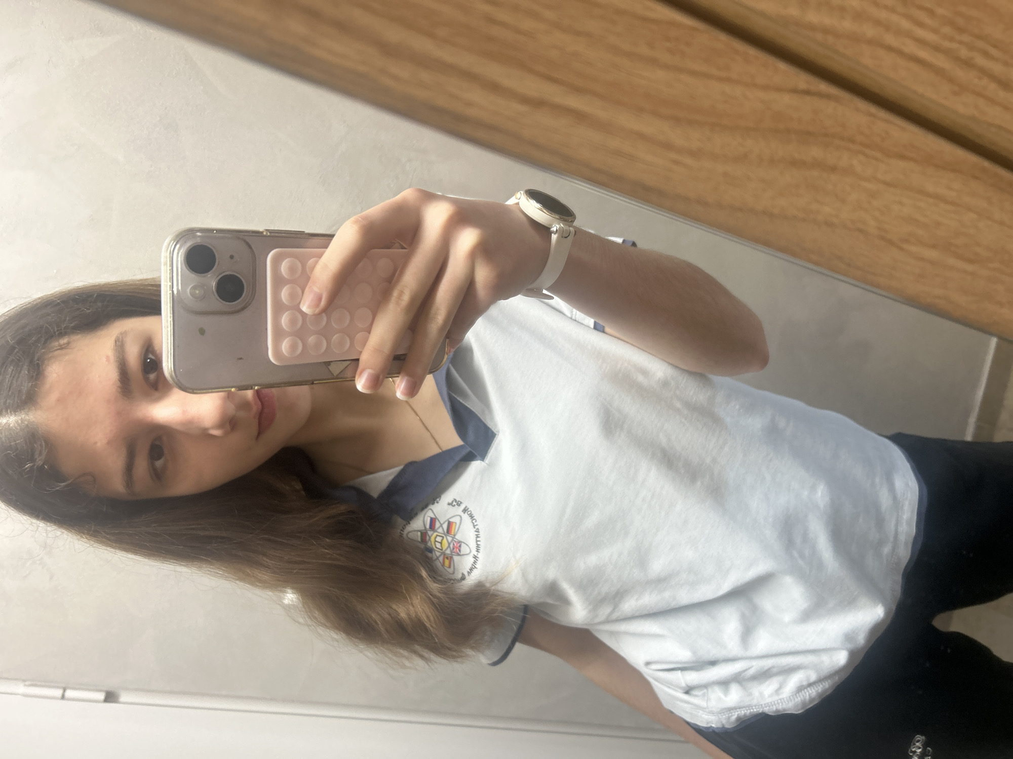 Young woman takes multiple selfies in Ruse, Bulgaria