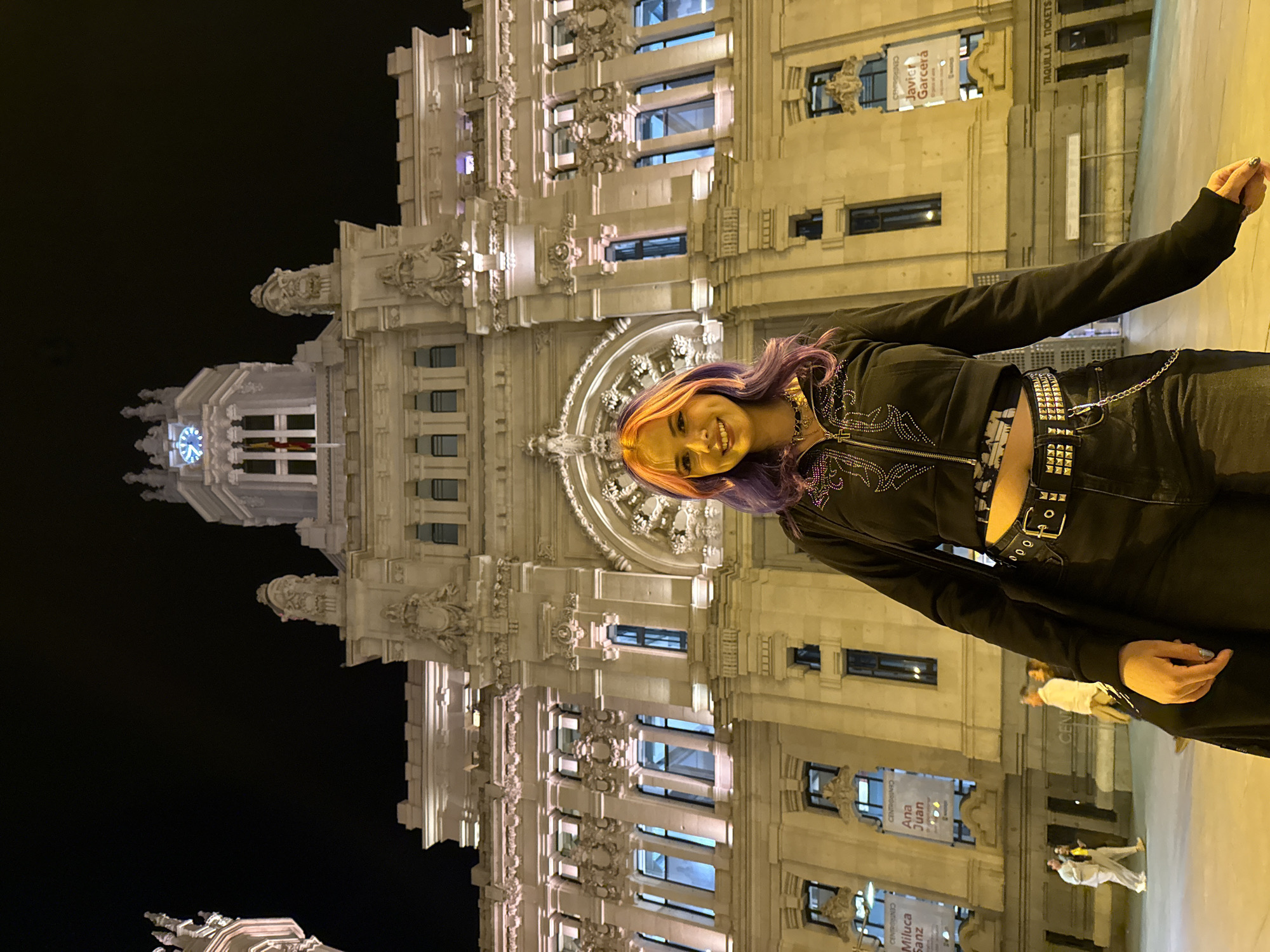 Nighttime architectural tour through illuminated historic Madrid buildings captured