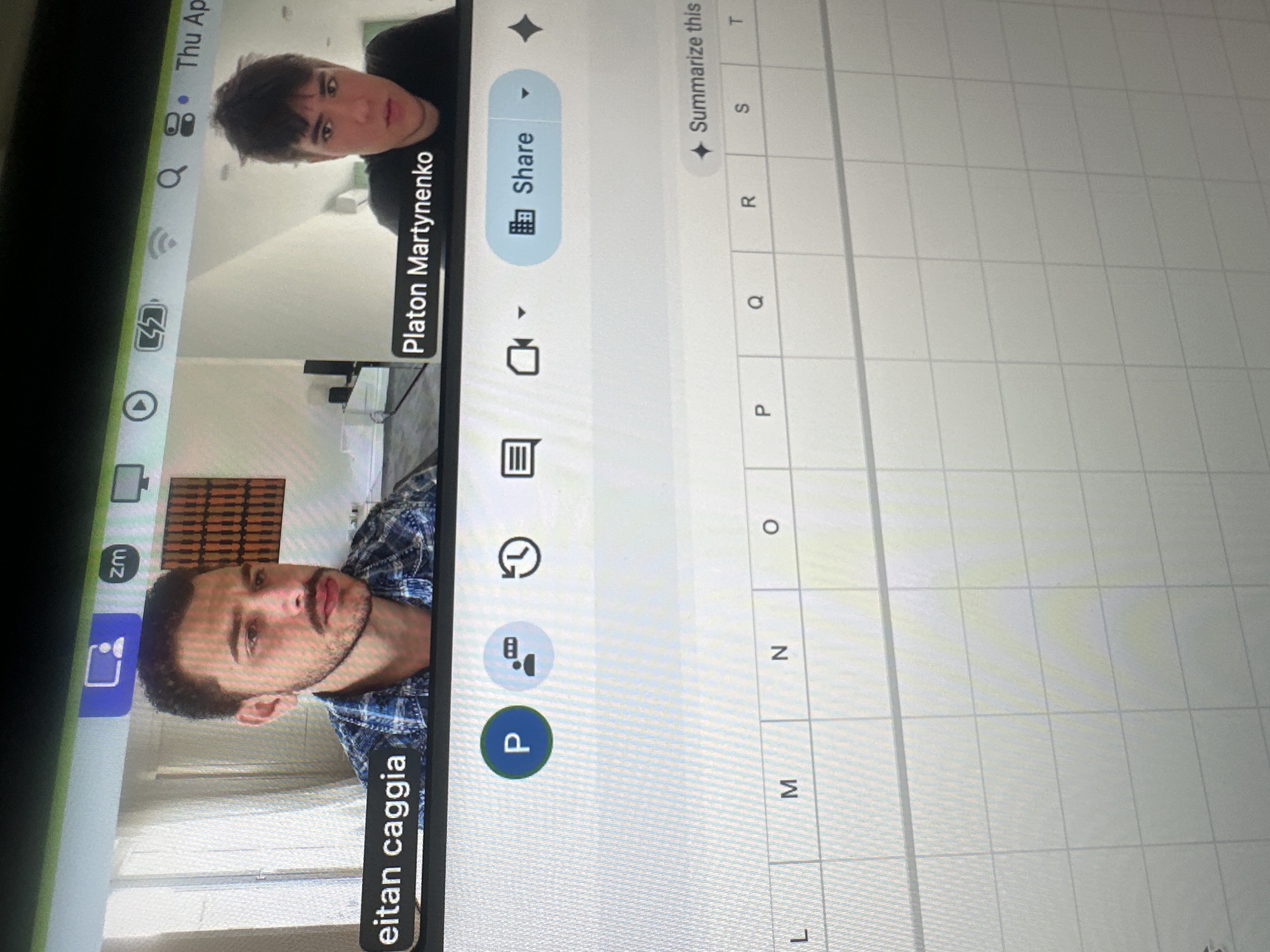Video conference call captured on computer screen in Milan