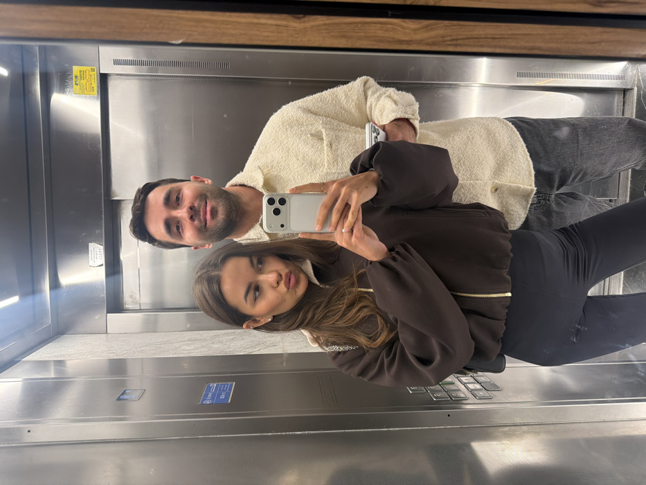 Casual moments captured in Tel Aviv: elevator selfie, dog petting