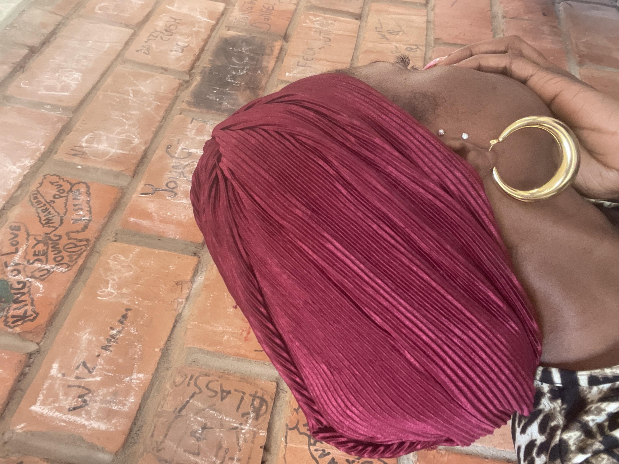 Nigerian TV segment spotlights luxury fashion accessories and FIRS branding