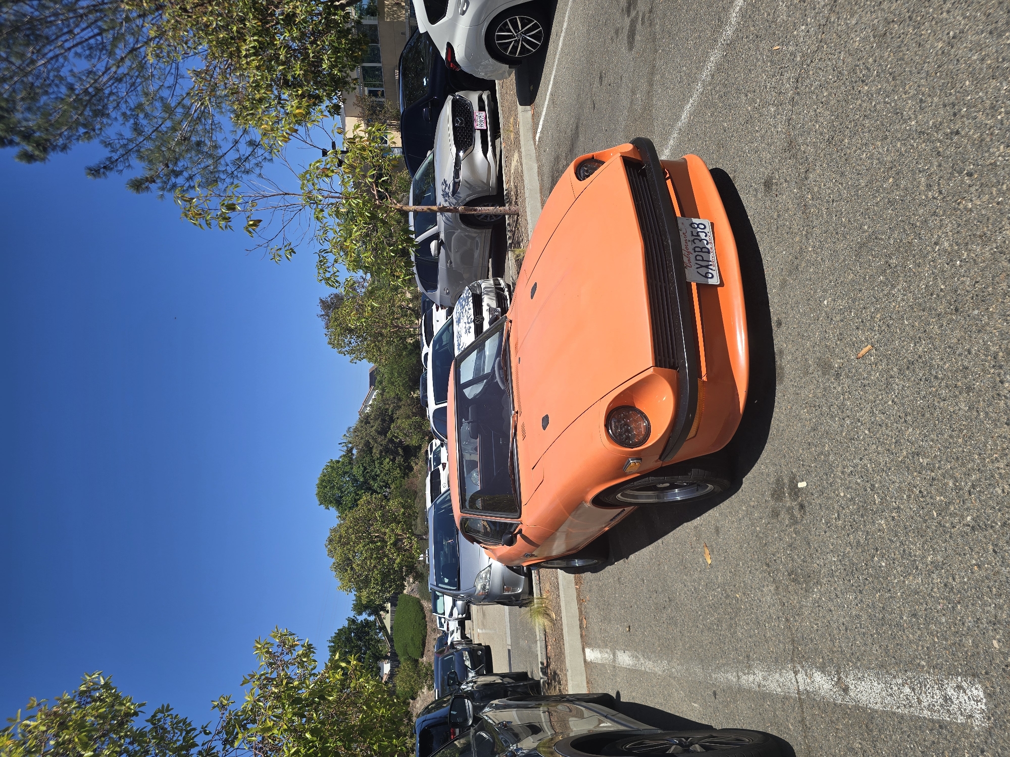 Orange 1970s Datsun 240Z spotted at Encinitas Community Park