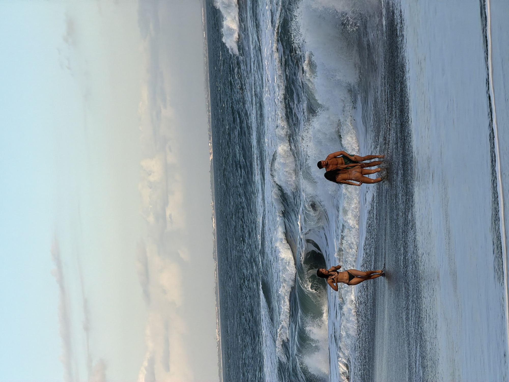 Tourists document beach day and temple visits in Mengwi