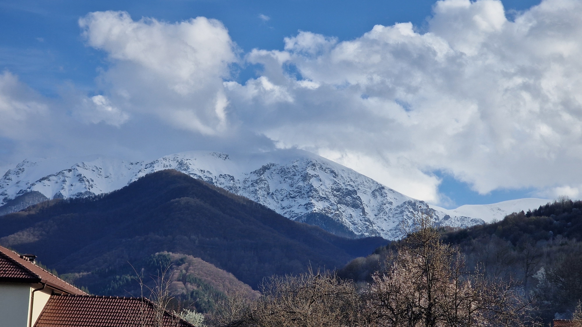Spring garden and mountain views documented in Apriltsi, Bulgaria