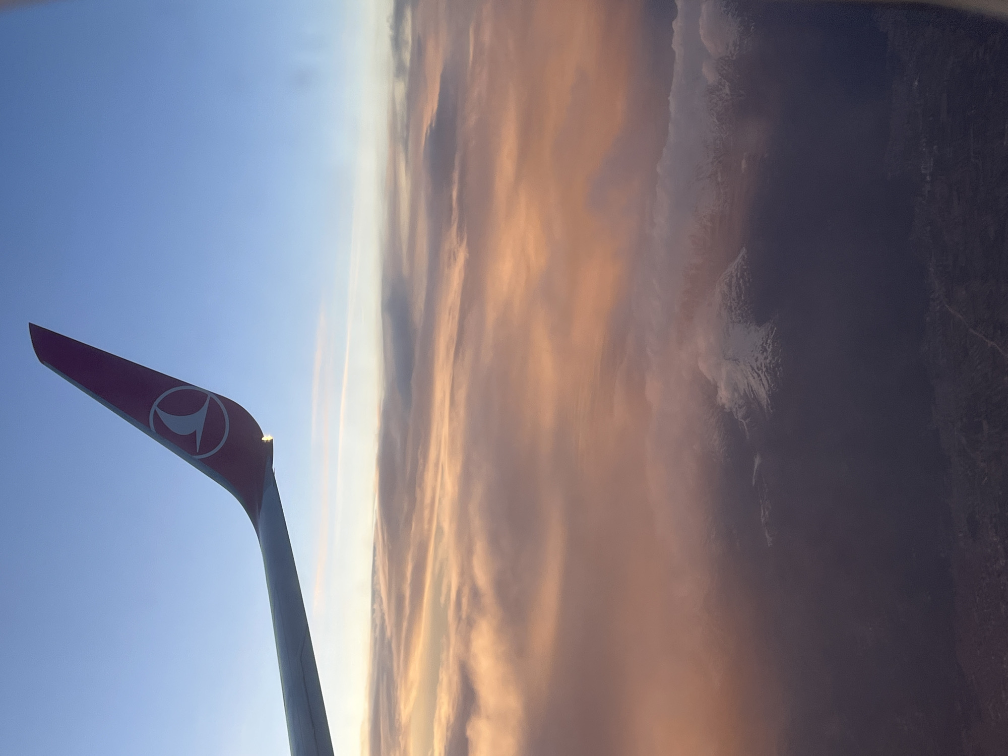 Turkish Airlines passenger documents sunset flight over Montenegro