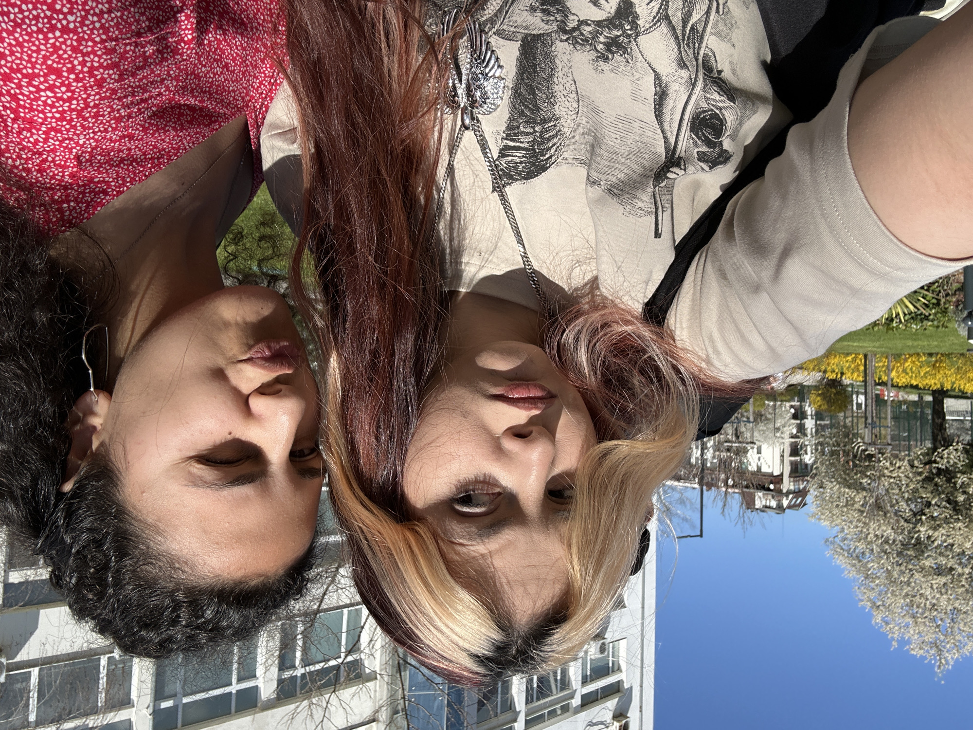 Two women take selfies on sunny morning in Sofia