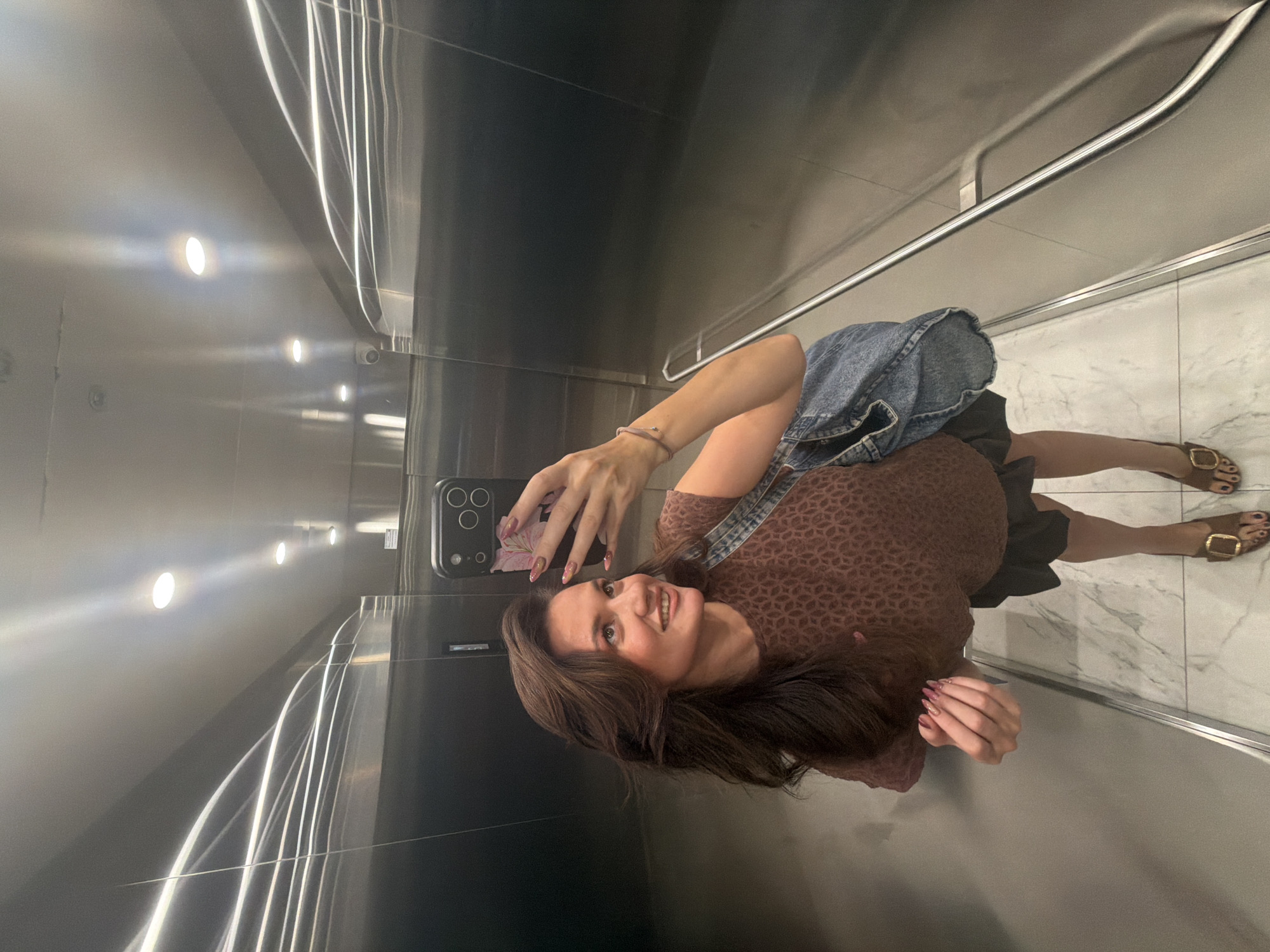 Elevator mirror selfie, two angles, Belgrade