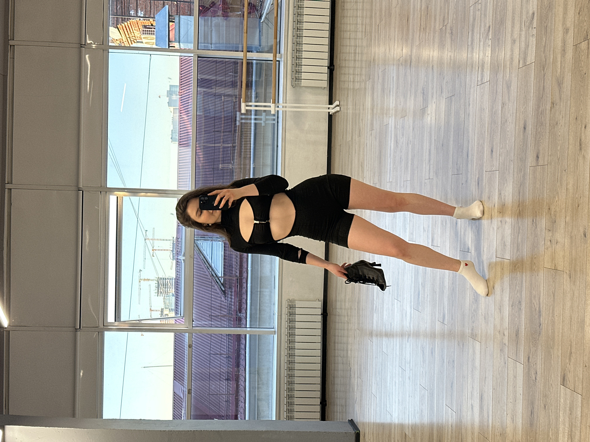 Woman observed during dance studio session in Ufa