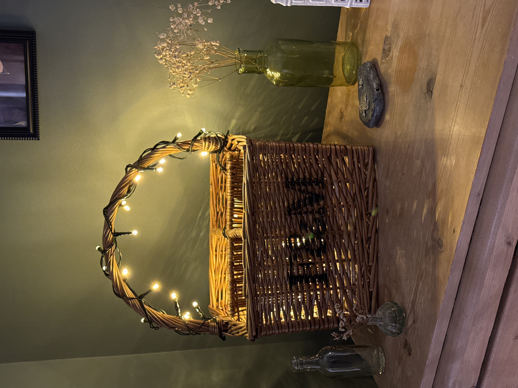Fairy light basket display captured in East Suffolk home