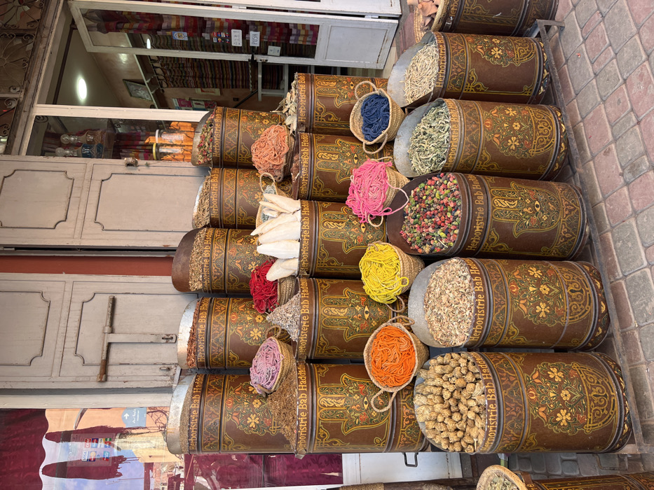 Tourist explores Marrakesh Medina souks and historic sites